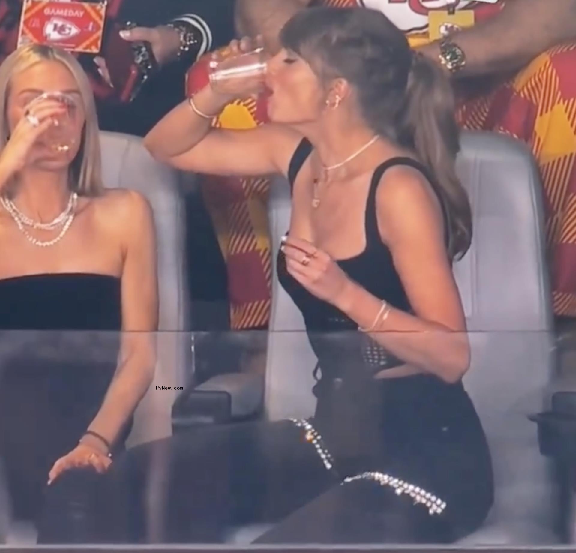 taylor swift drinking a beer