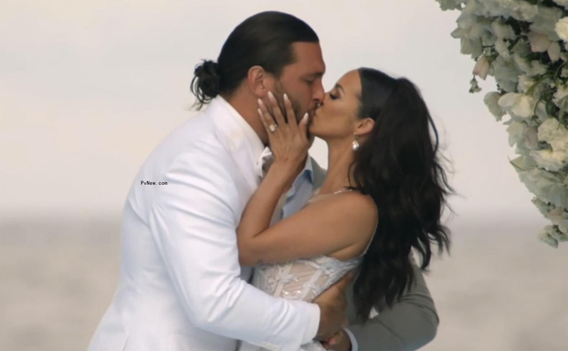 Brock Davies and Scheana Shay kissing on their wedding day