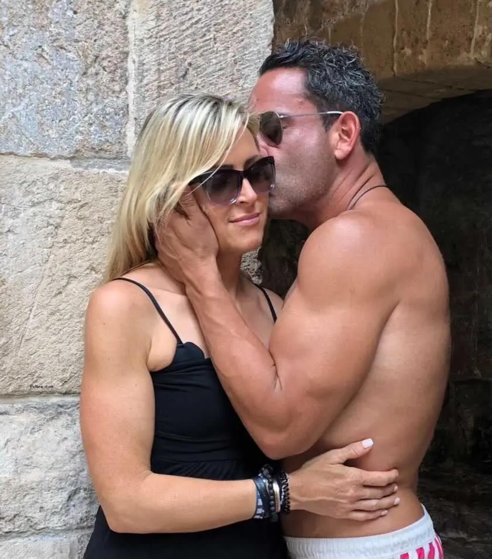 Luis Ruelas giving Vanessa Reiser a kiss on her forehead