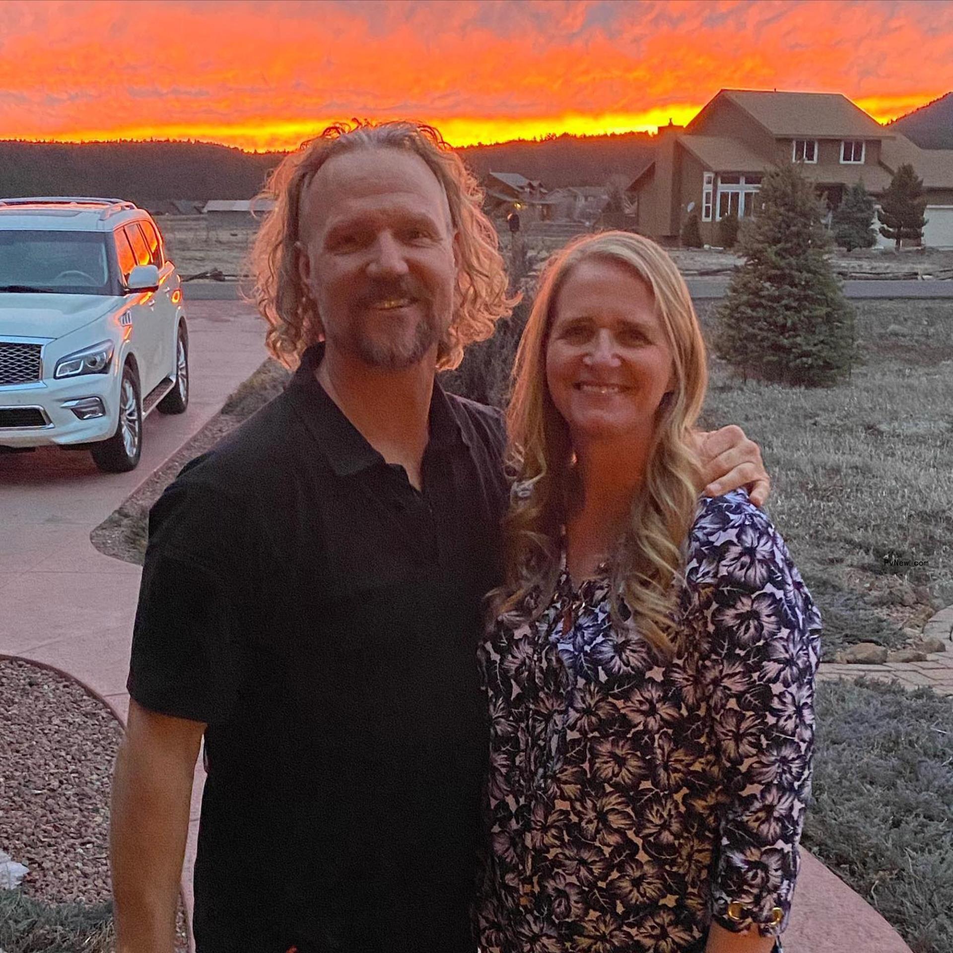 Christine Brown and Kody Brown smile at sunset
