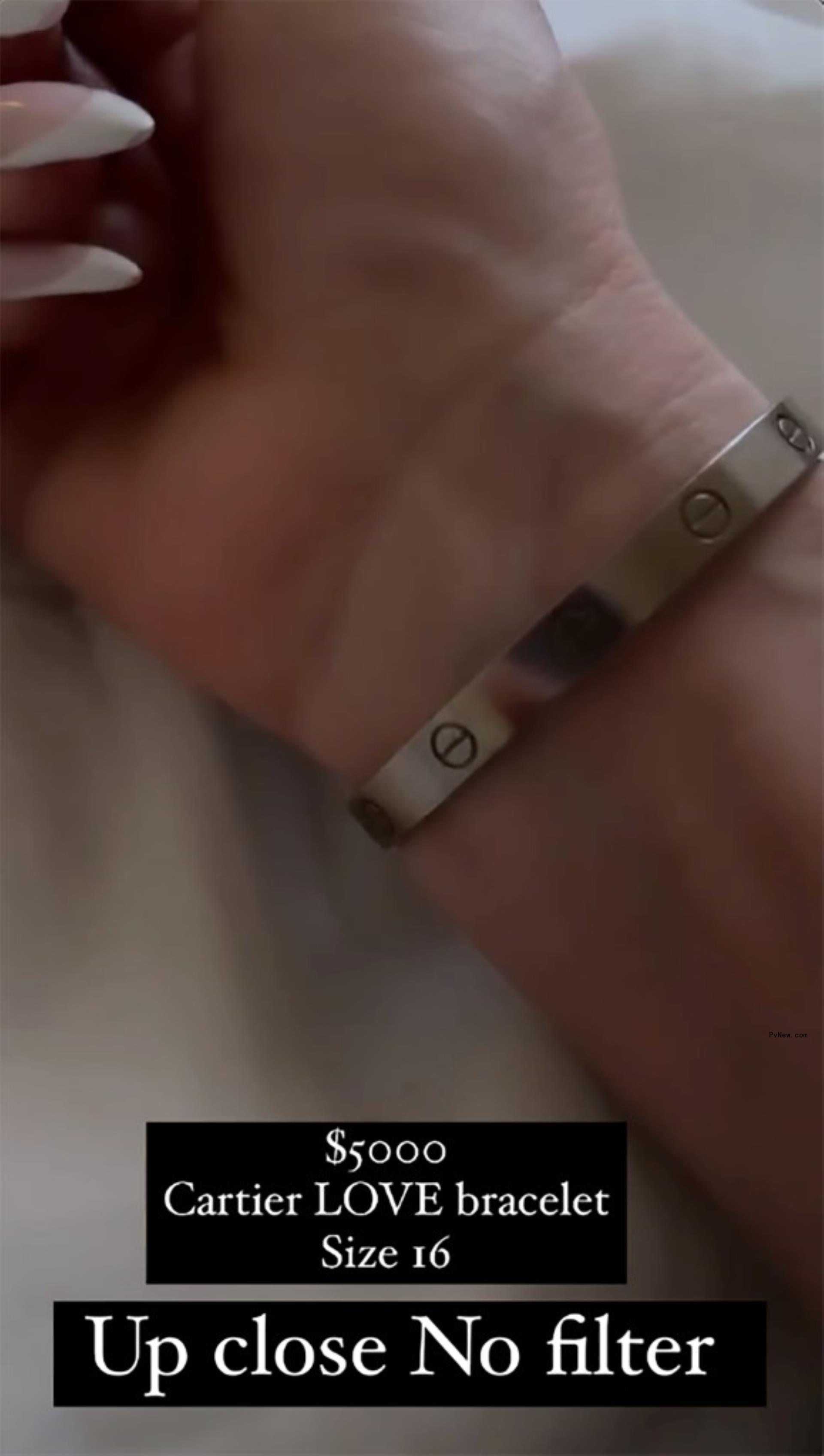 close-up photo of cartier love bracelet on a woman's wrist