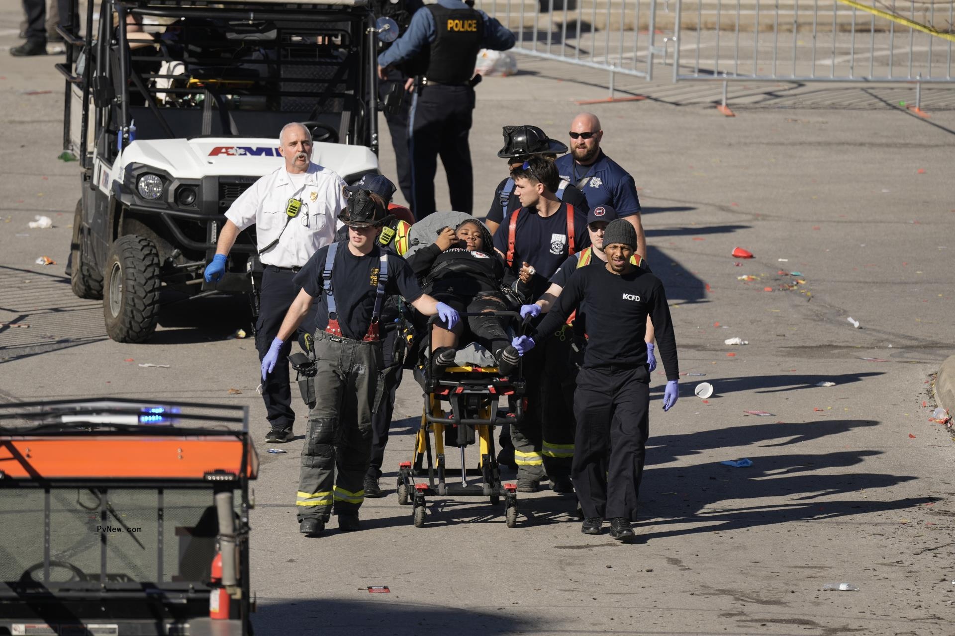 A person being taken away in an ambulance at the Kansas City Chiefs parade.
