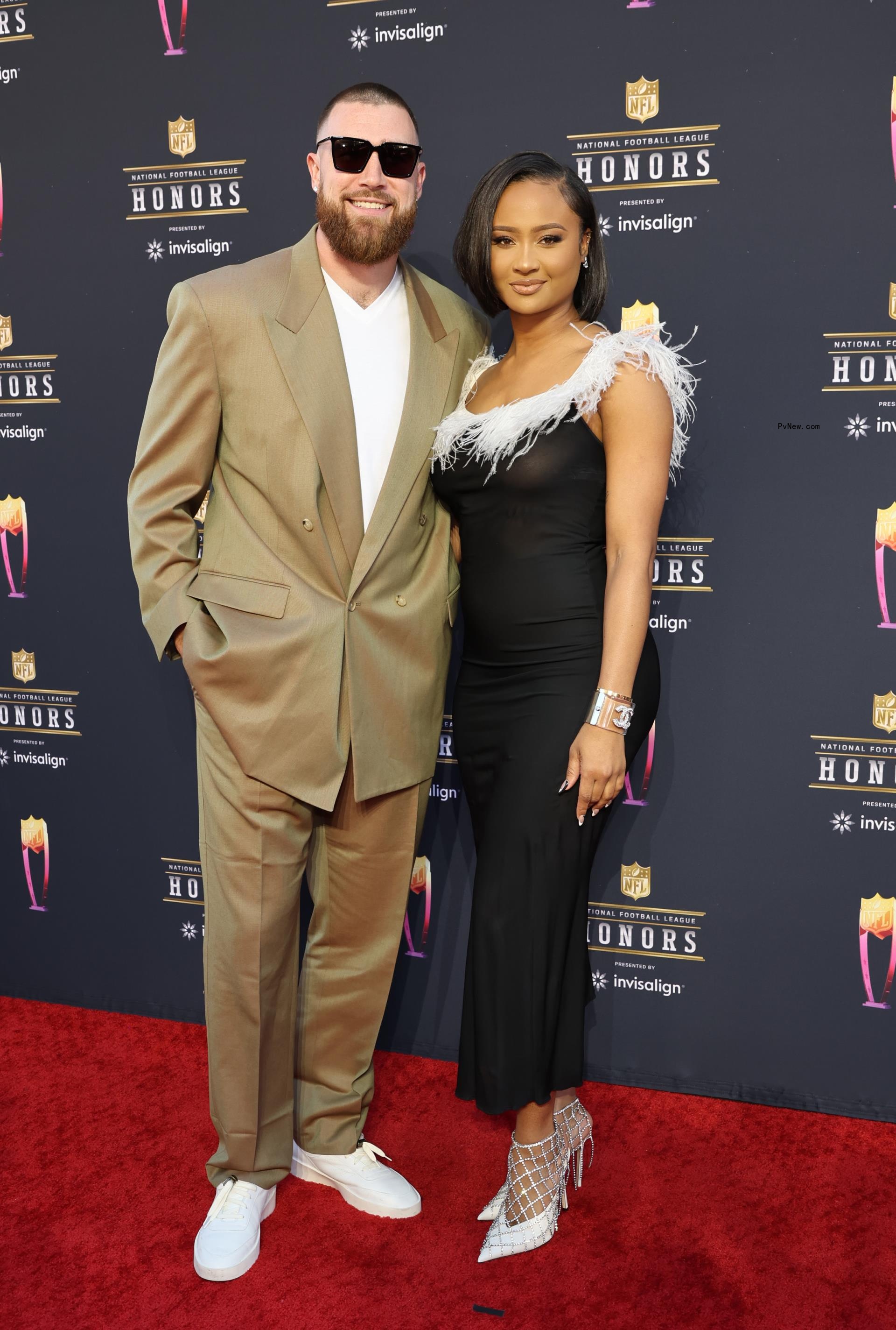 Travis Kelce and Kayla Nicole posing together