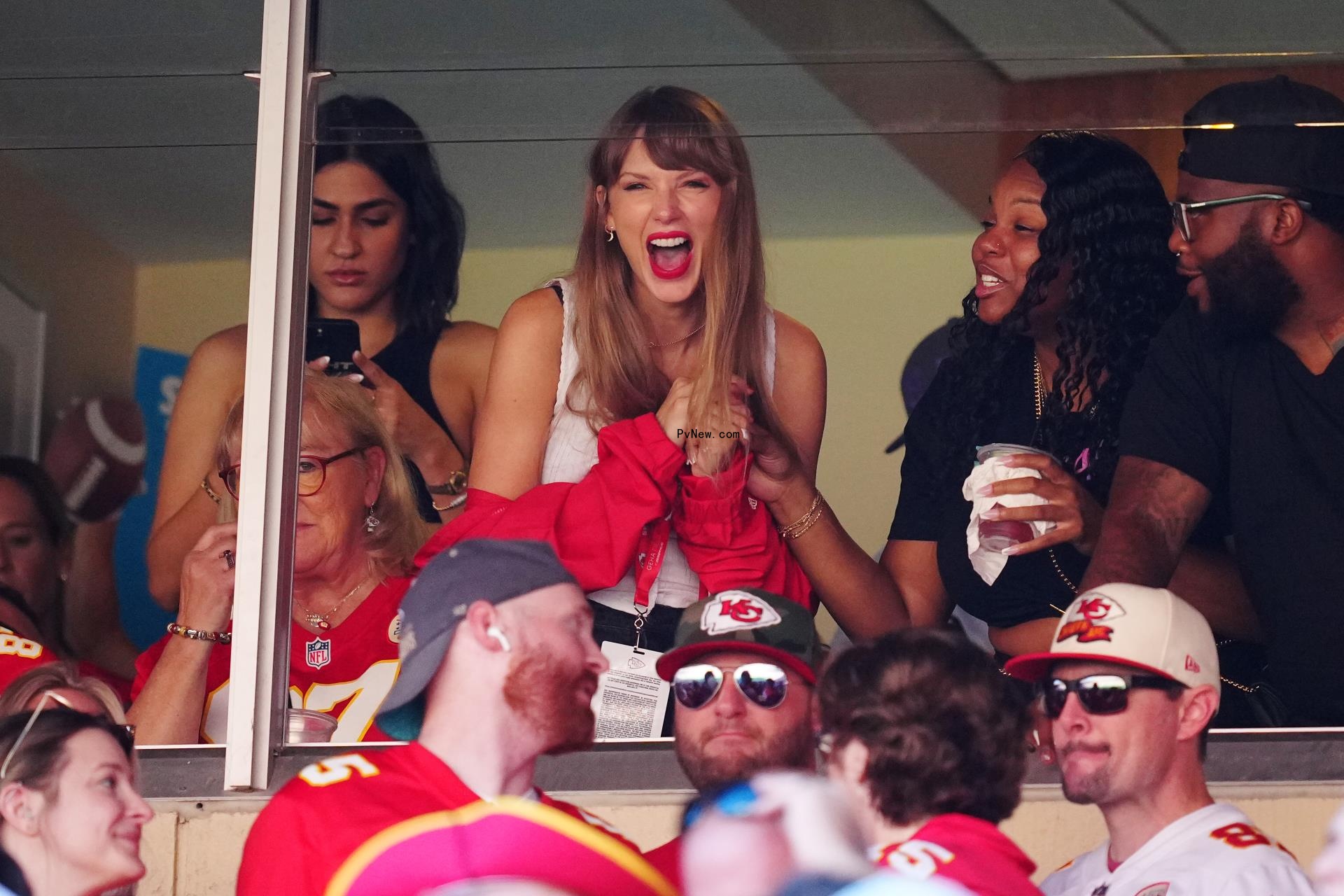 Taylor Swift cheering at the Kansas City Chiefs game