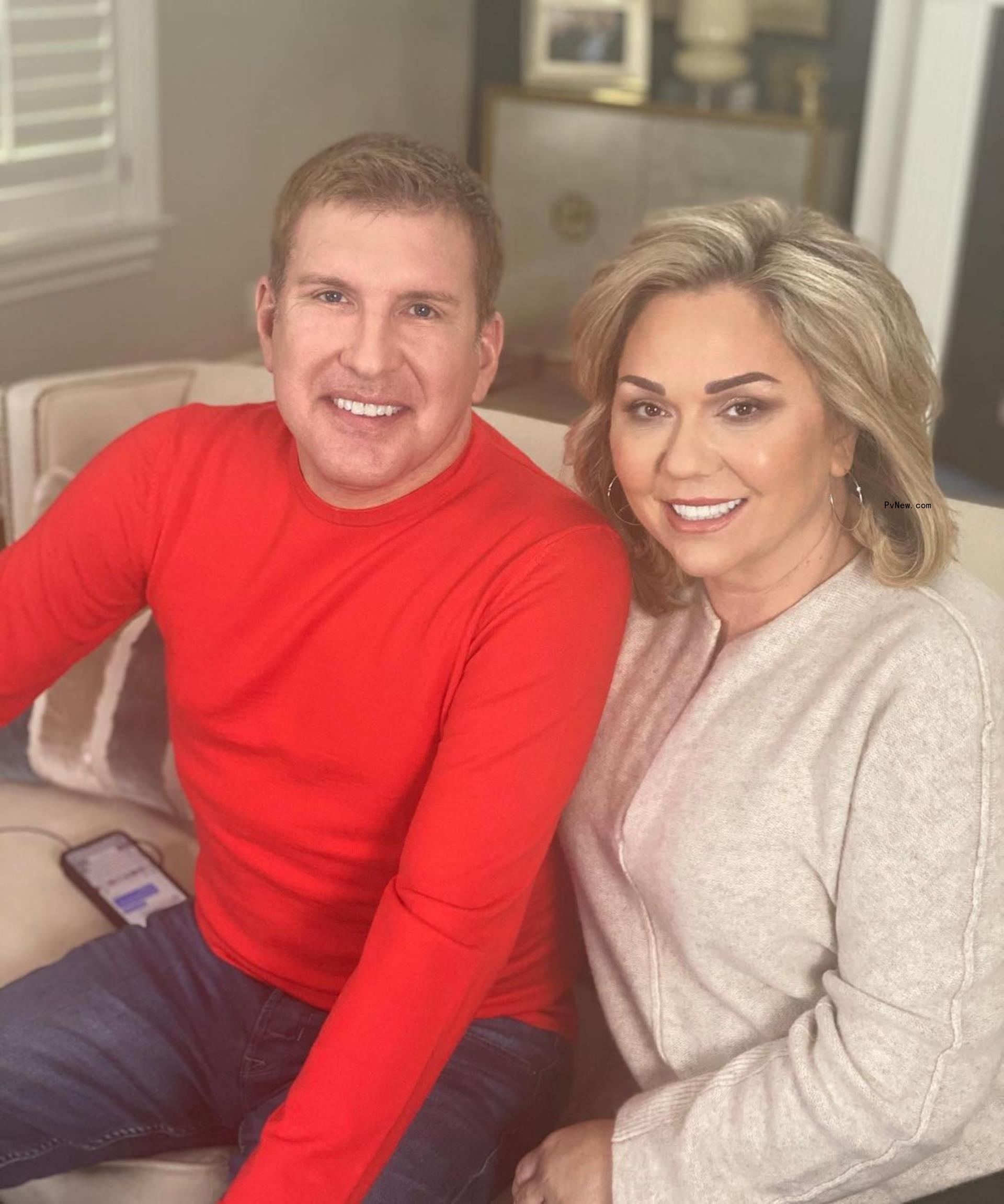 Julie Chrisley and Todd Chrisley smiling.