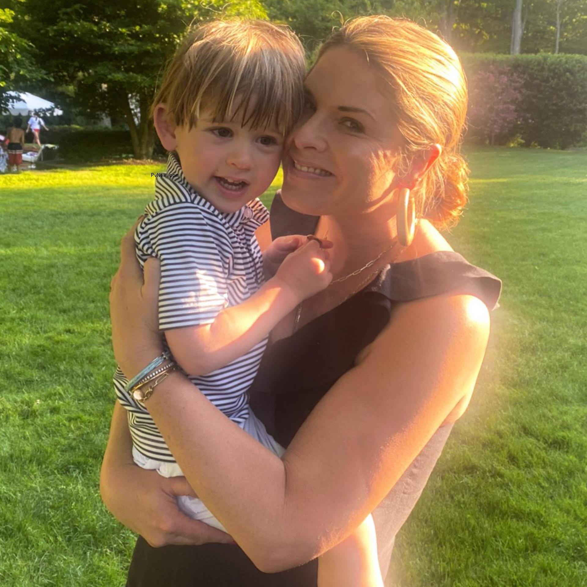 Jenna Bush Hager holding up Hal Hager