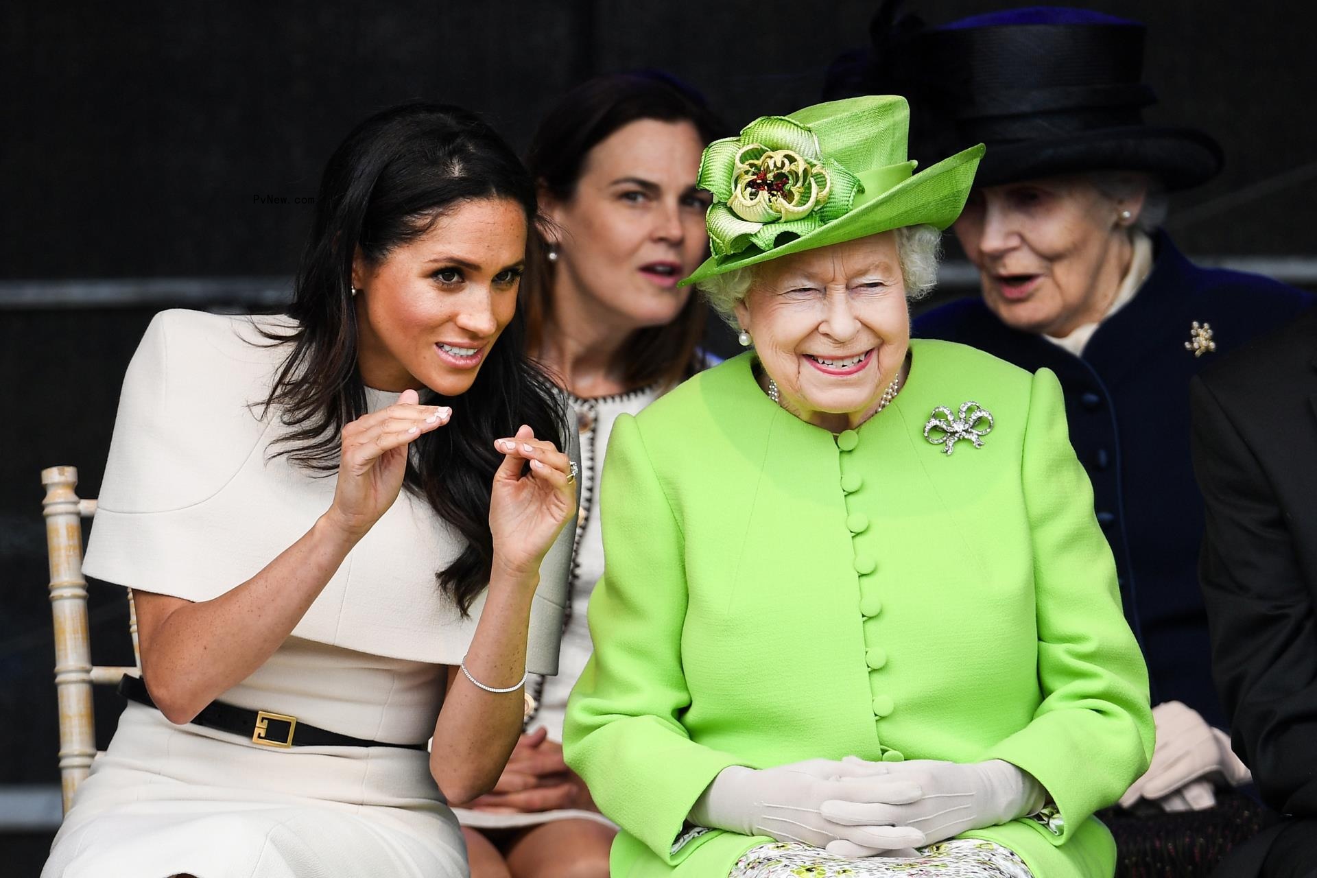 Queen Elizabeth II with Meghan Markle.