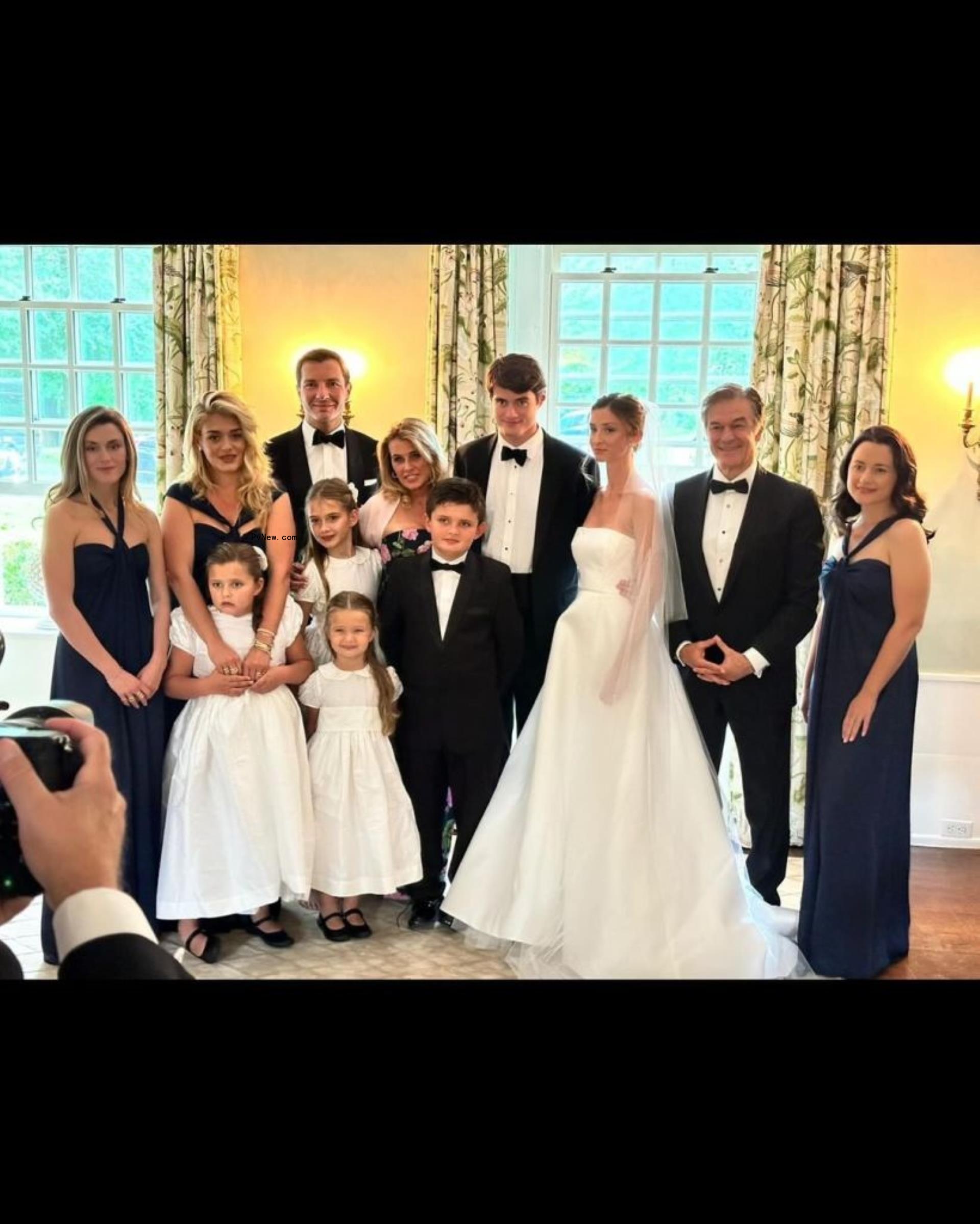 Oliver Ozz and Katie Finn with their family.