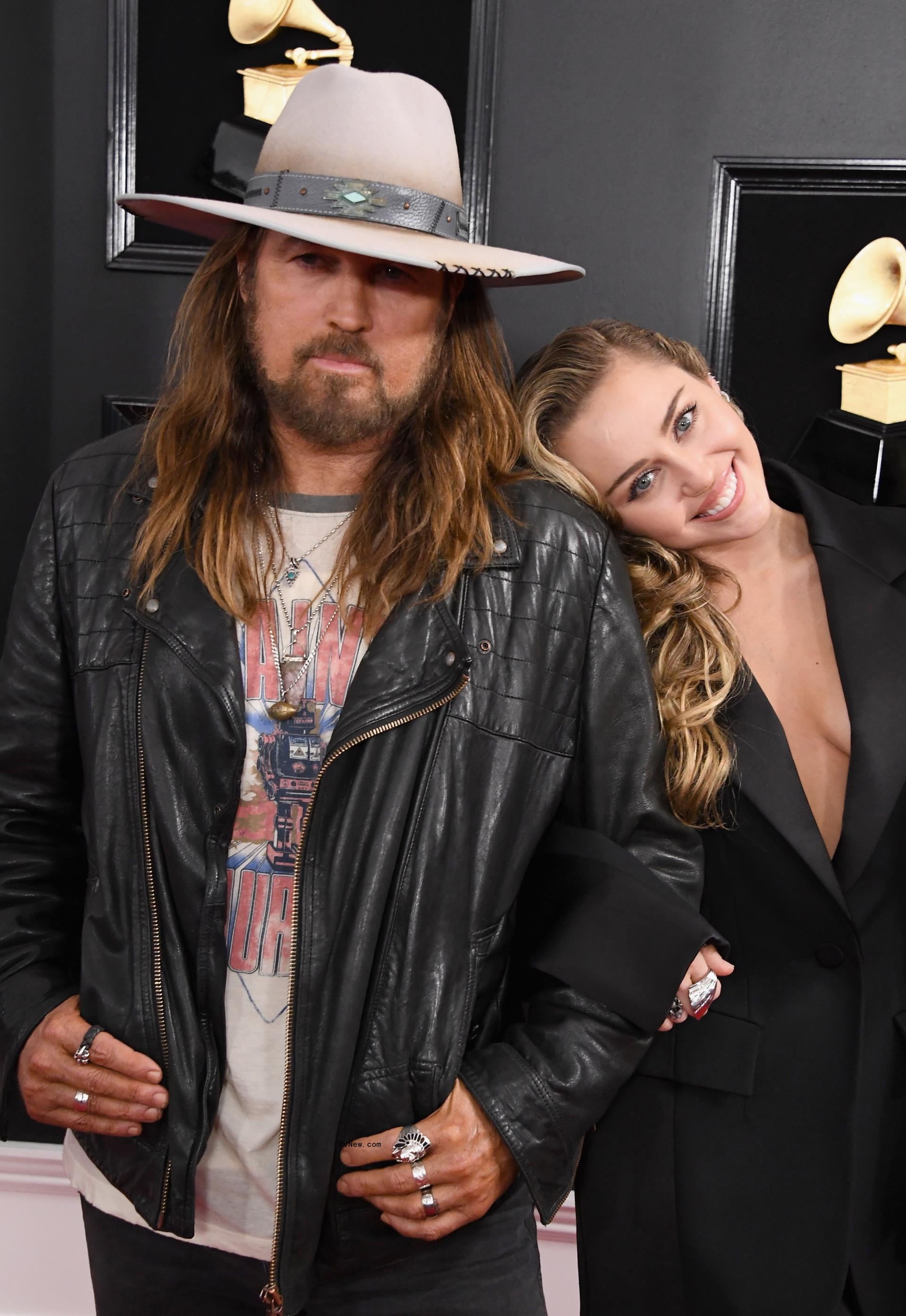 Miley Cyrus and Billy Ray Cyrus.