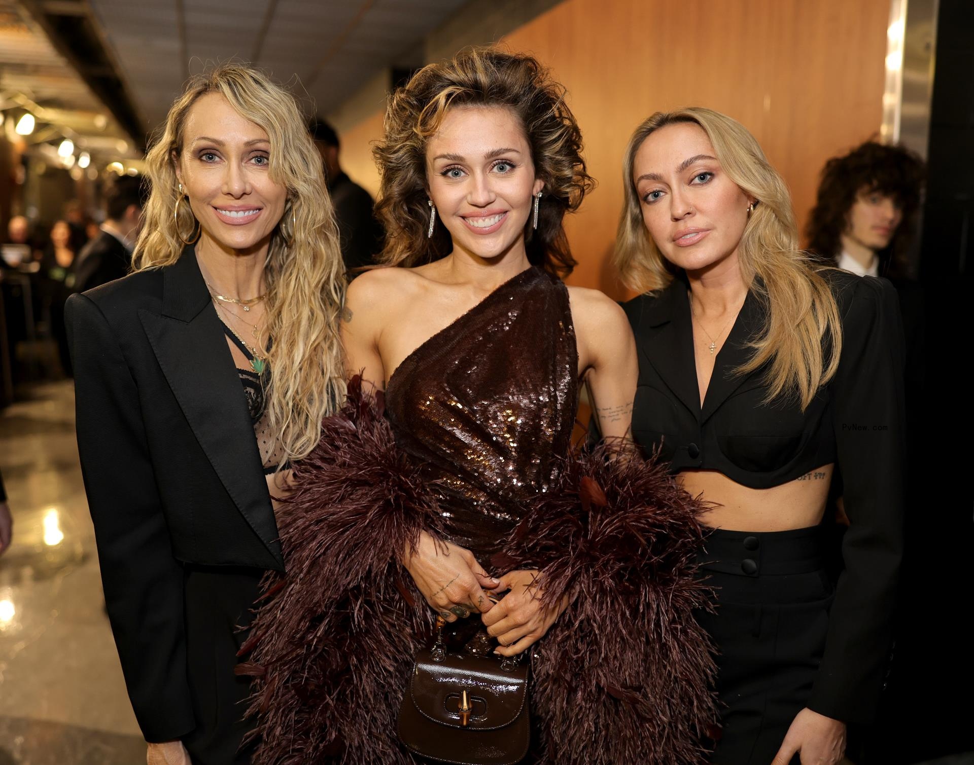 Tish Cyrus, Miley Cyrus and Brandi Cyrus attend the 66th GRAMMY Awards