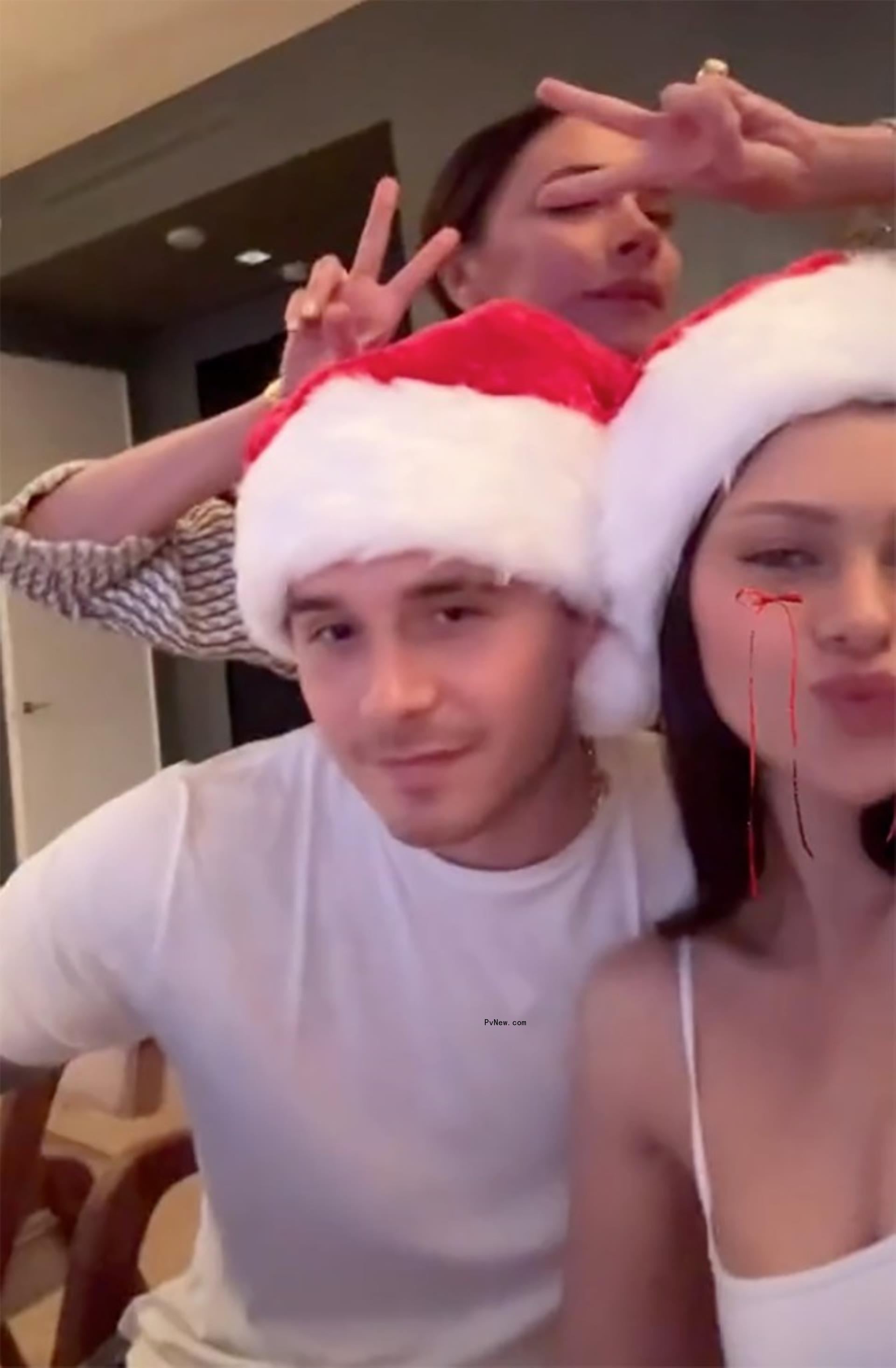 Victoria Beckham and Nicola Peltz and Brooklyn Beckham. 