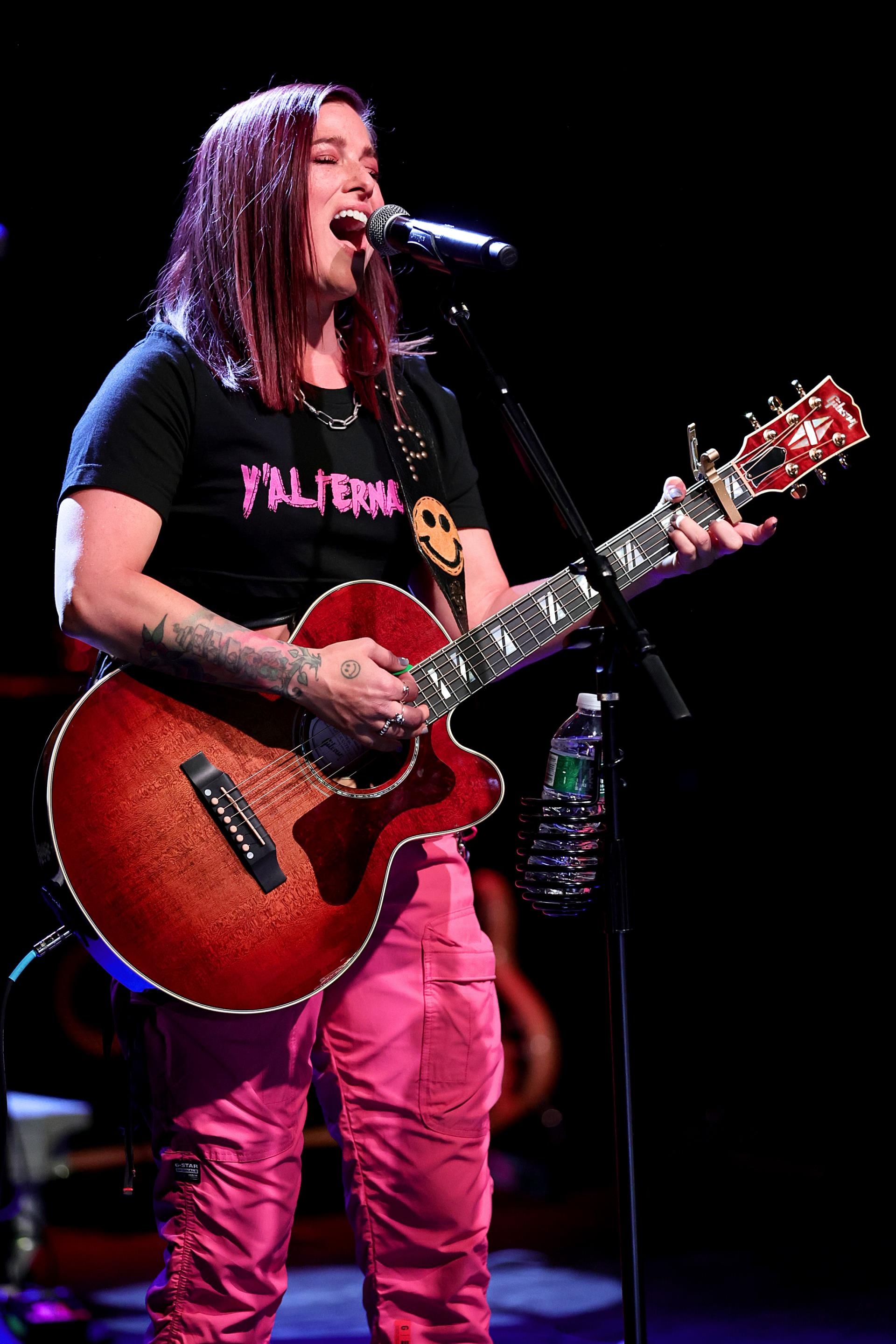Cassadee Pope singing on stage