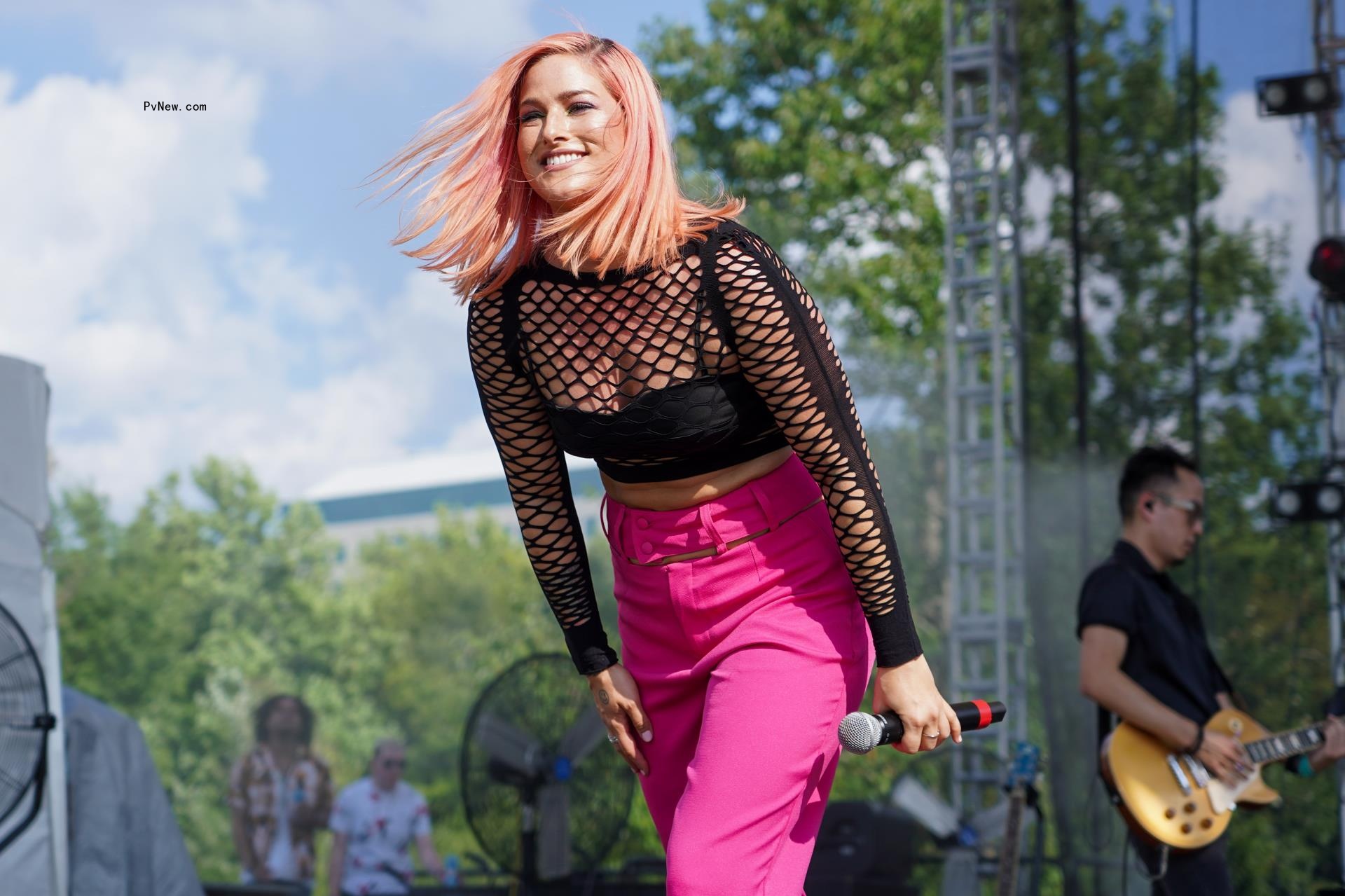 Cassadee Pope posing smiling for a photo