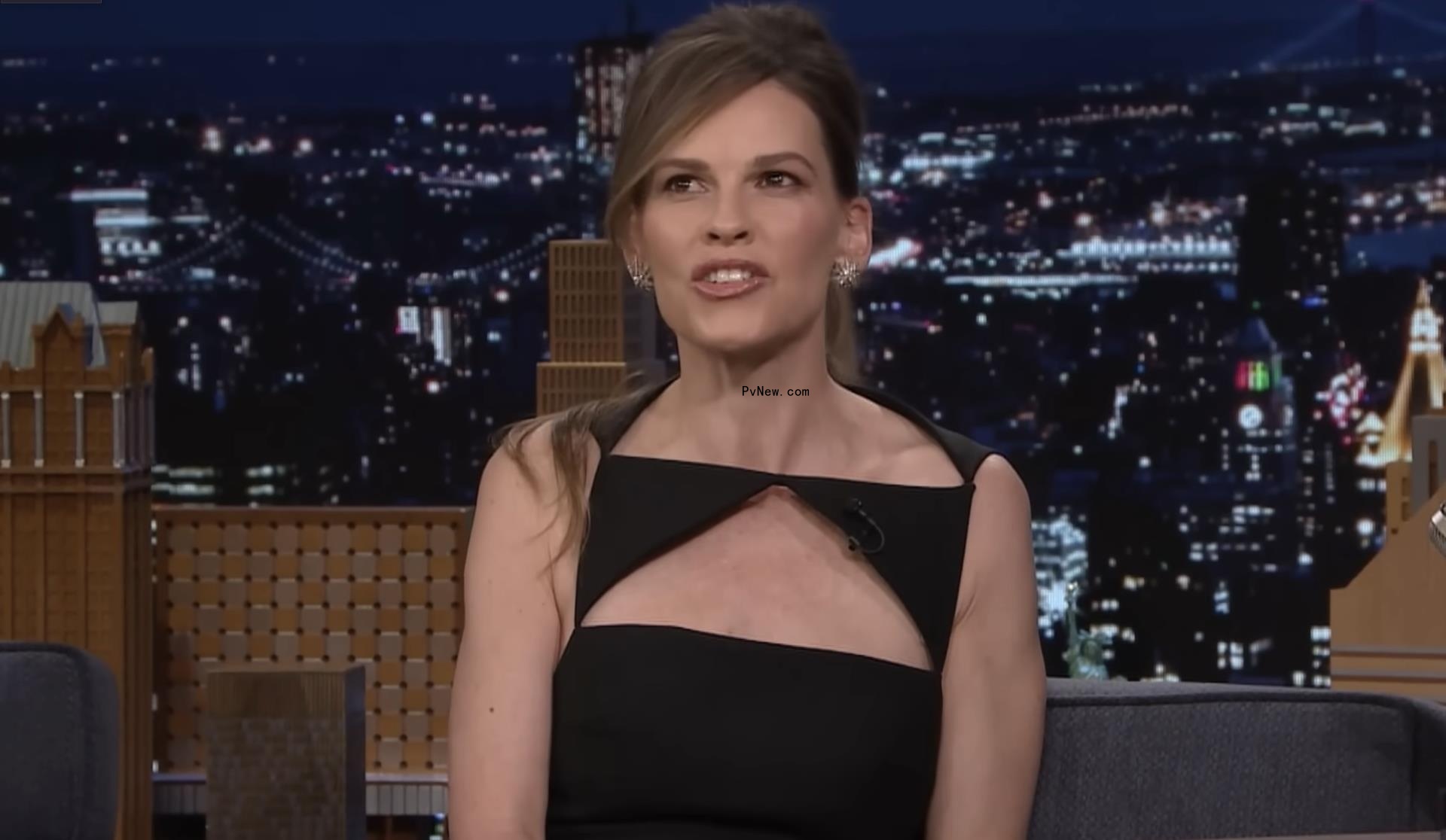 Hilary Swank talking on