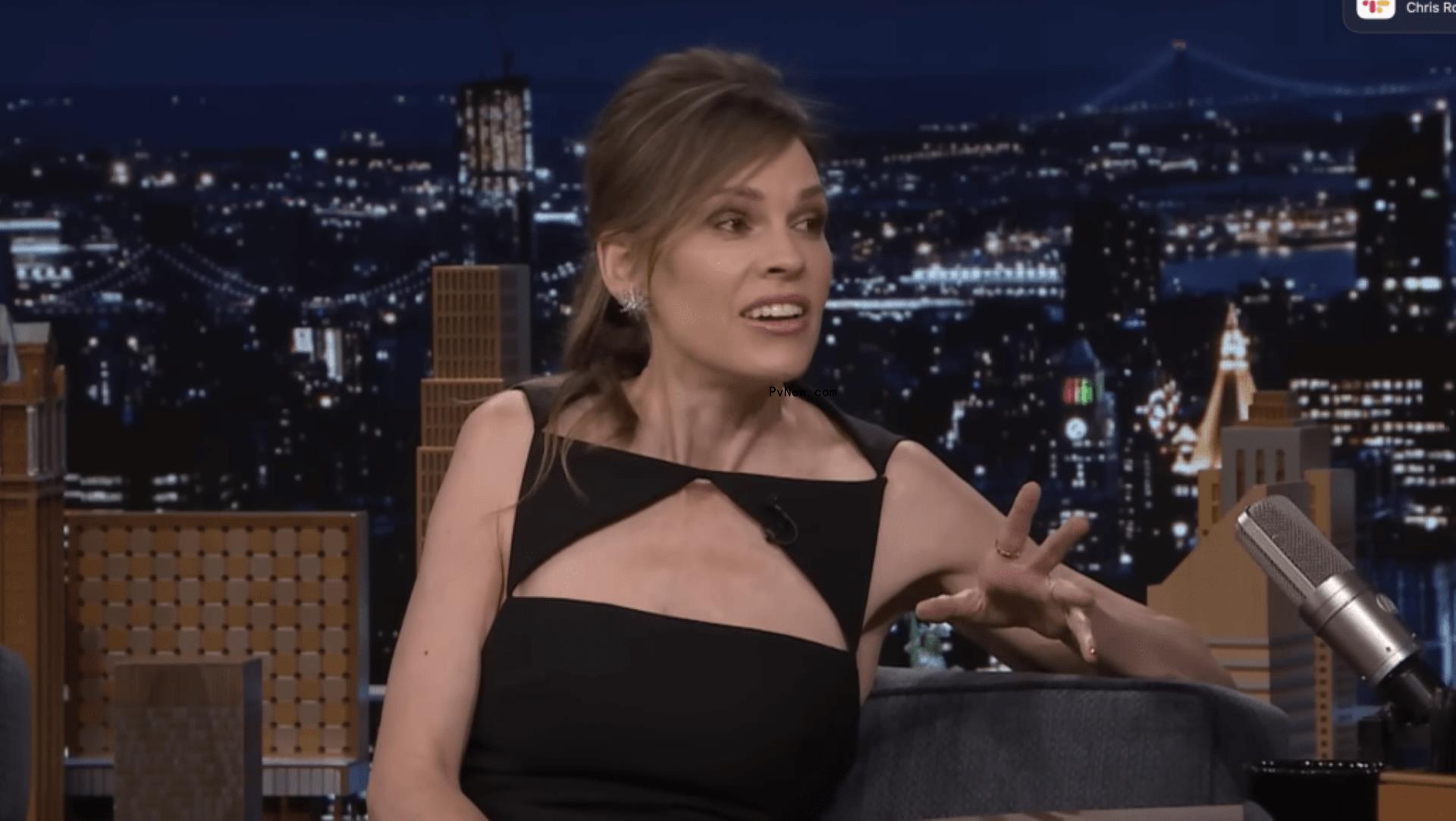 Hilary Swank talking on