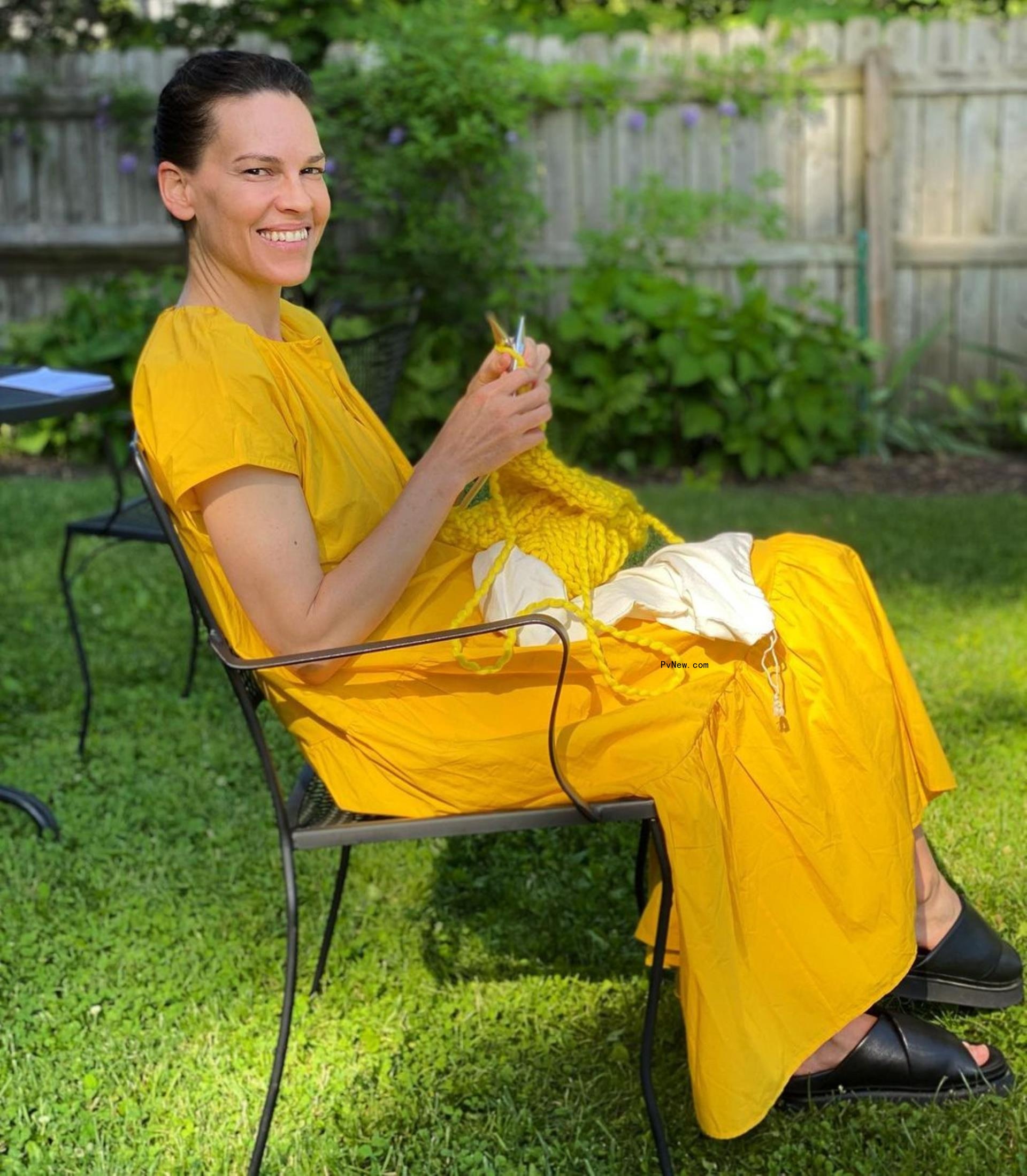 Hilary Swank sitting