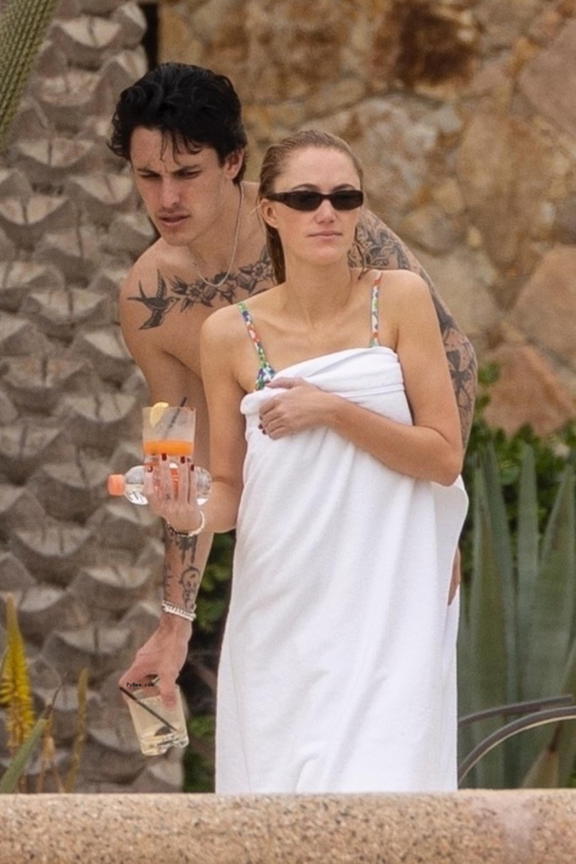 Dalton Gomez walks with Maika Mo<i></i>nroe in Mexico