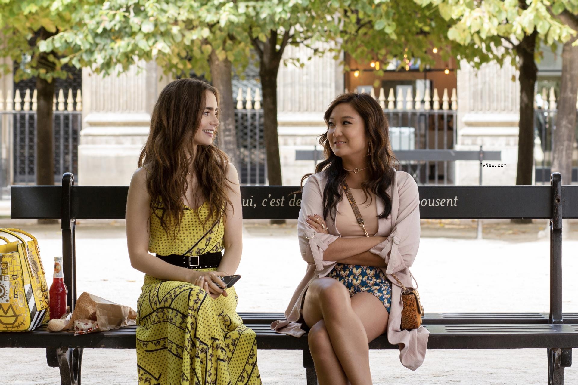 Ashley Park and Lilly Collins in a scene from