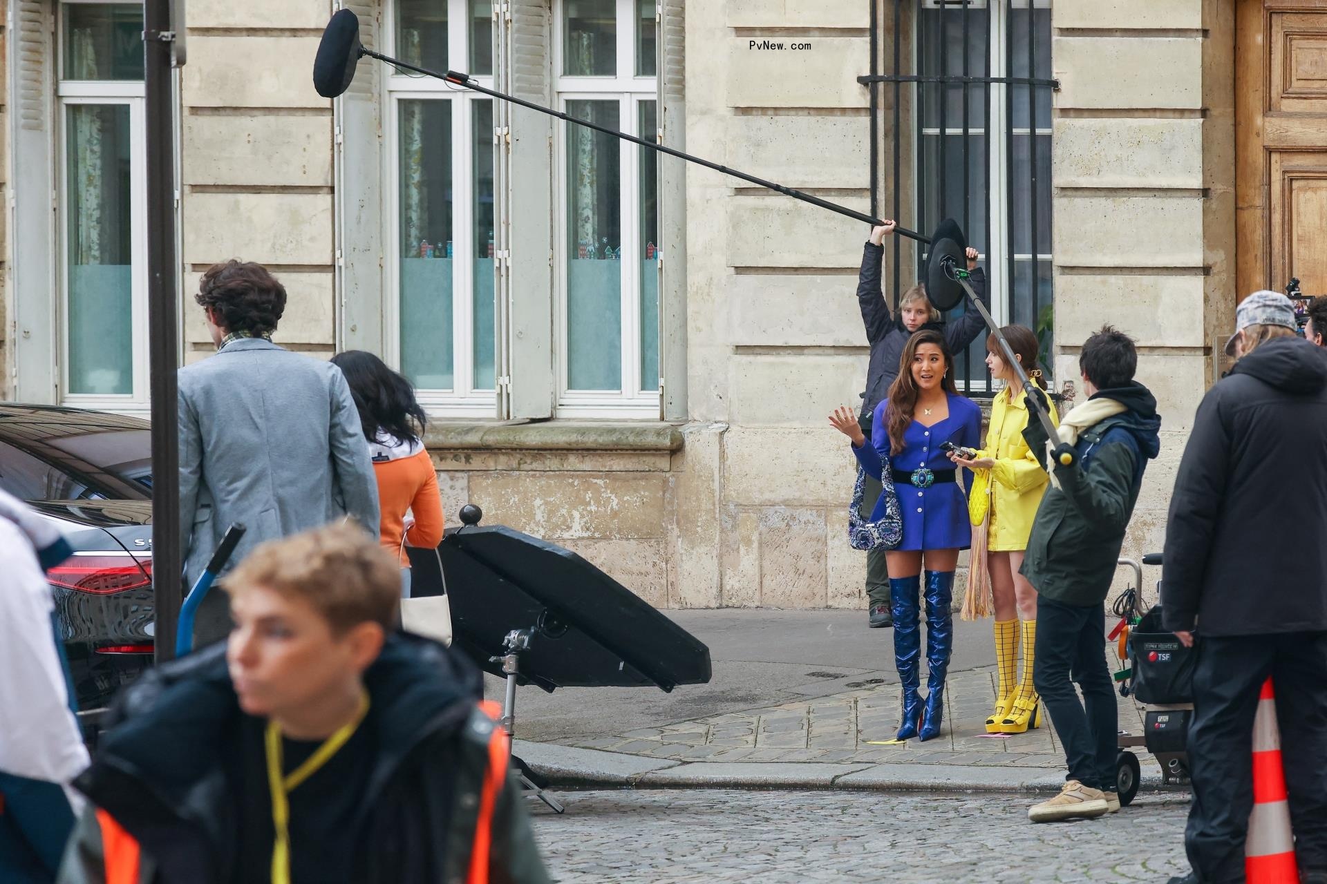 Ashley Park and Lilly Collins on set of