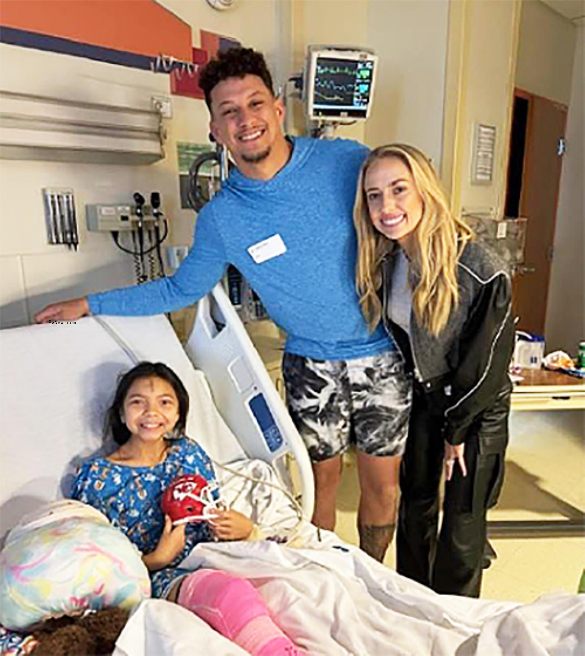 Patrick Mahomes and Brittany Mahomes with Chiefs shooting victim.