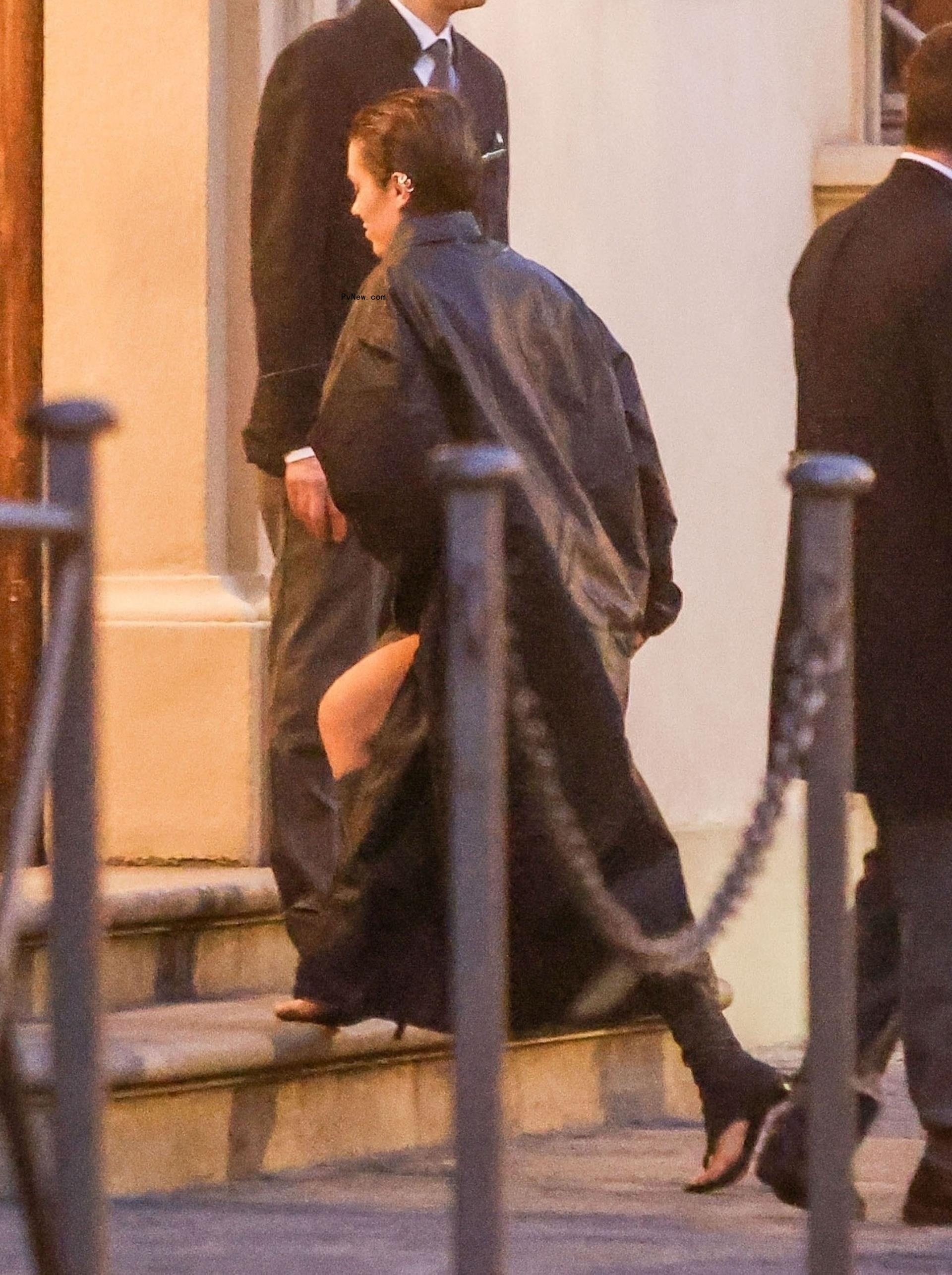 Bianca Censori going into a restaurant in Italy.