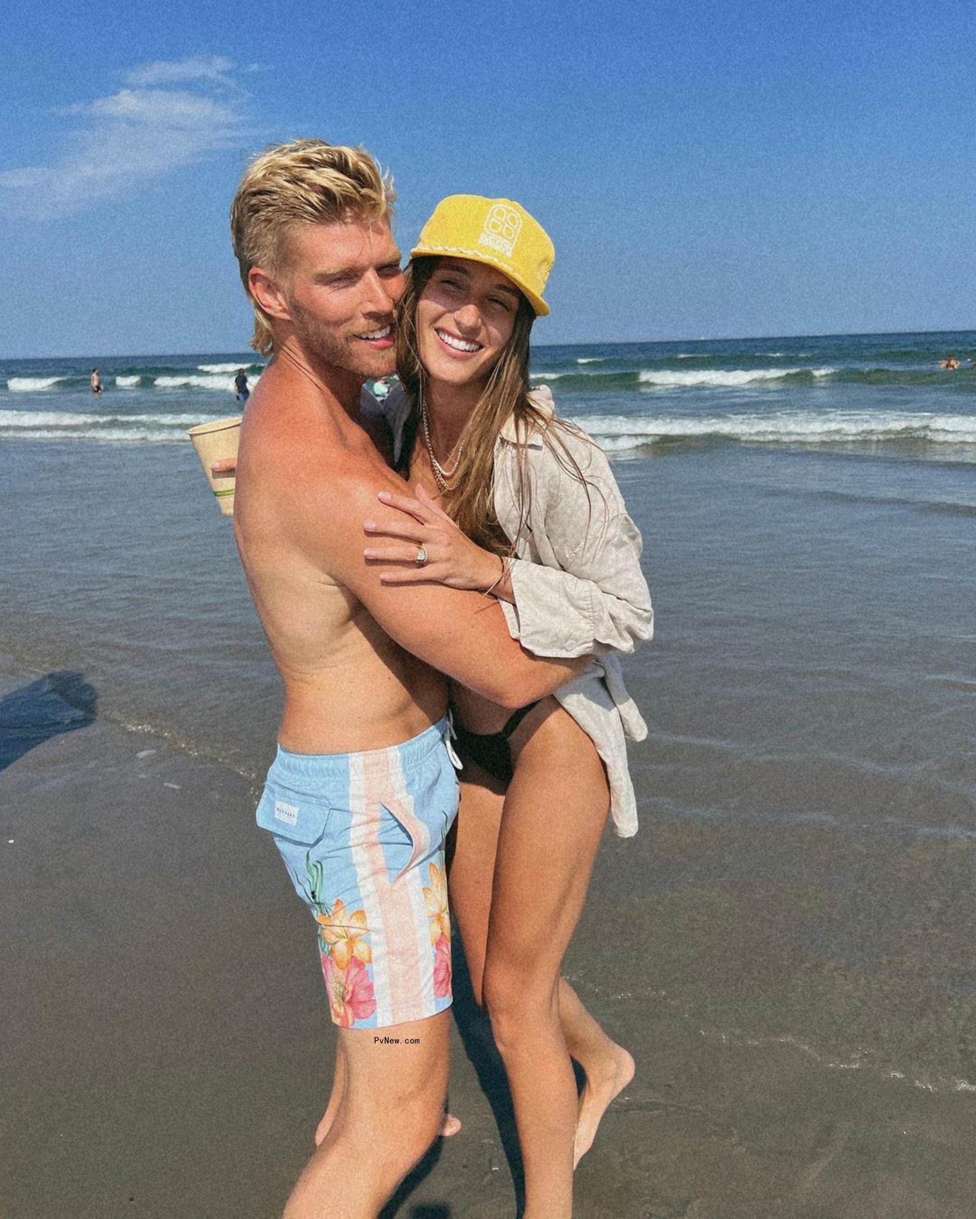 Kyle Cooke holding Amanda Batula