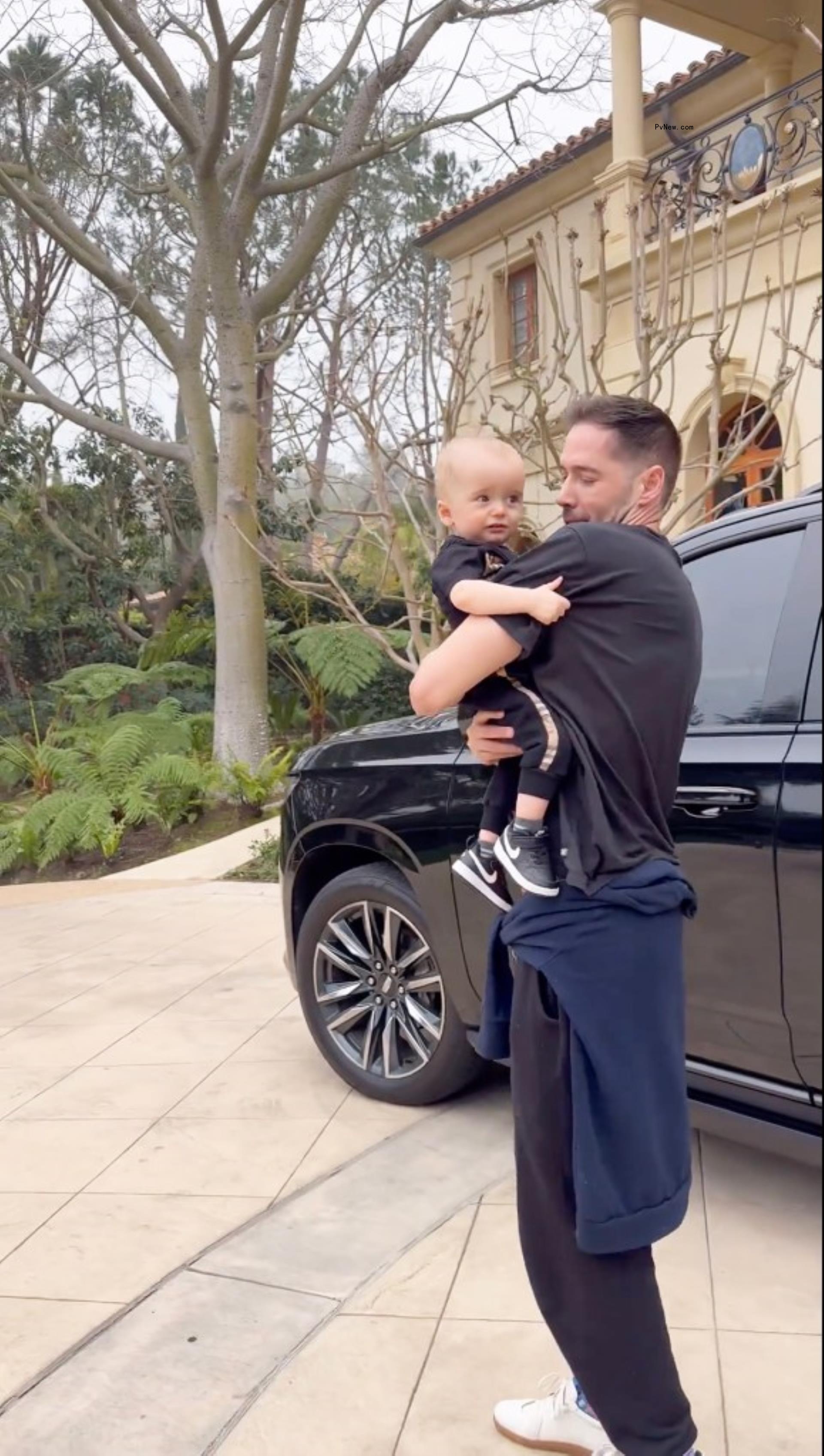 Paris Hilton's husband Carter Reum and their son, Phoenix.