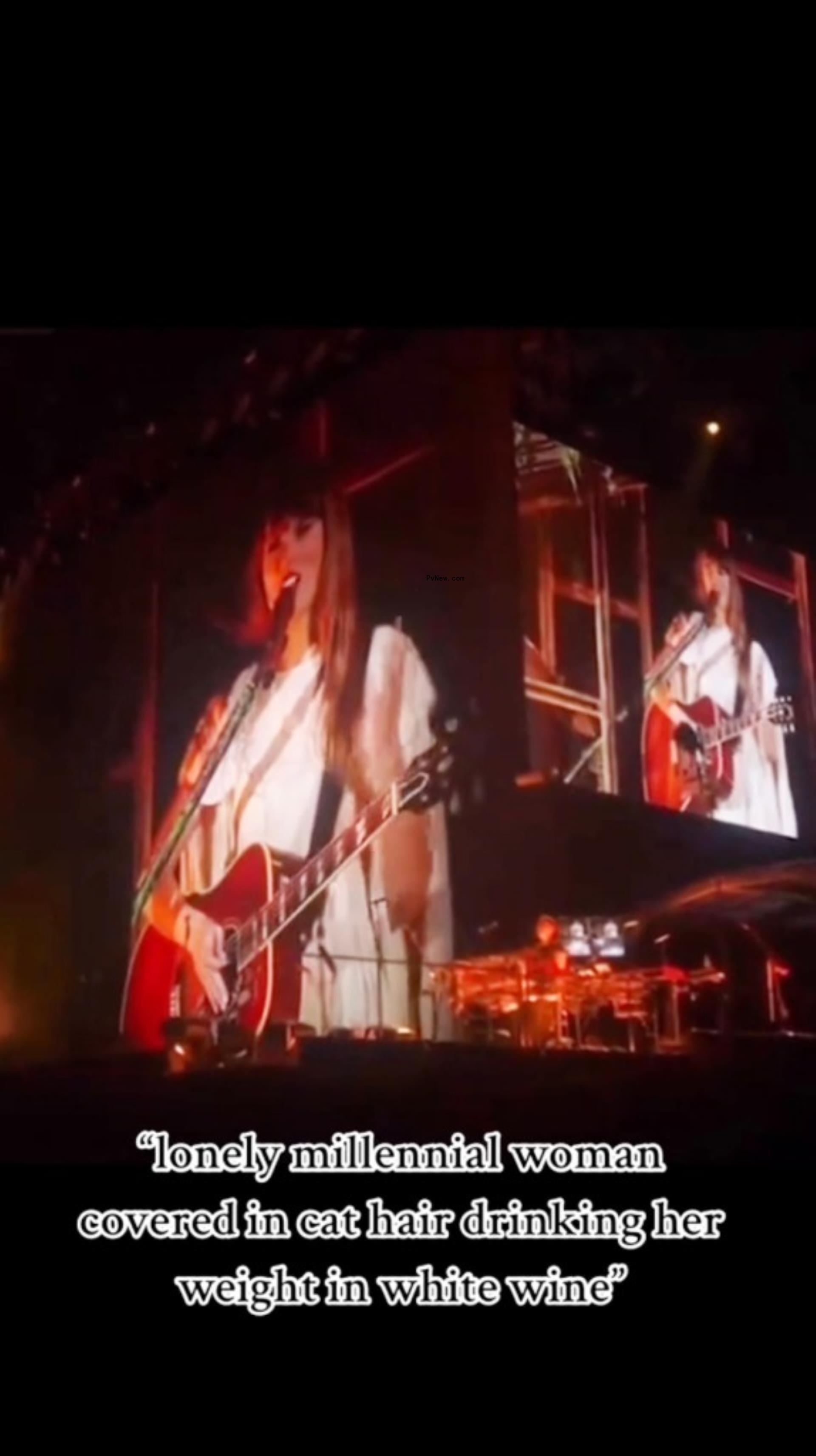Taylor Swift performing at the Eras Tour.