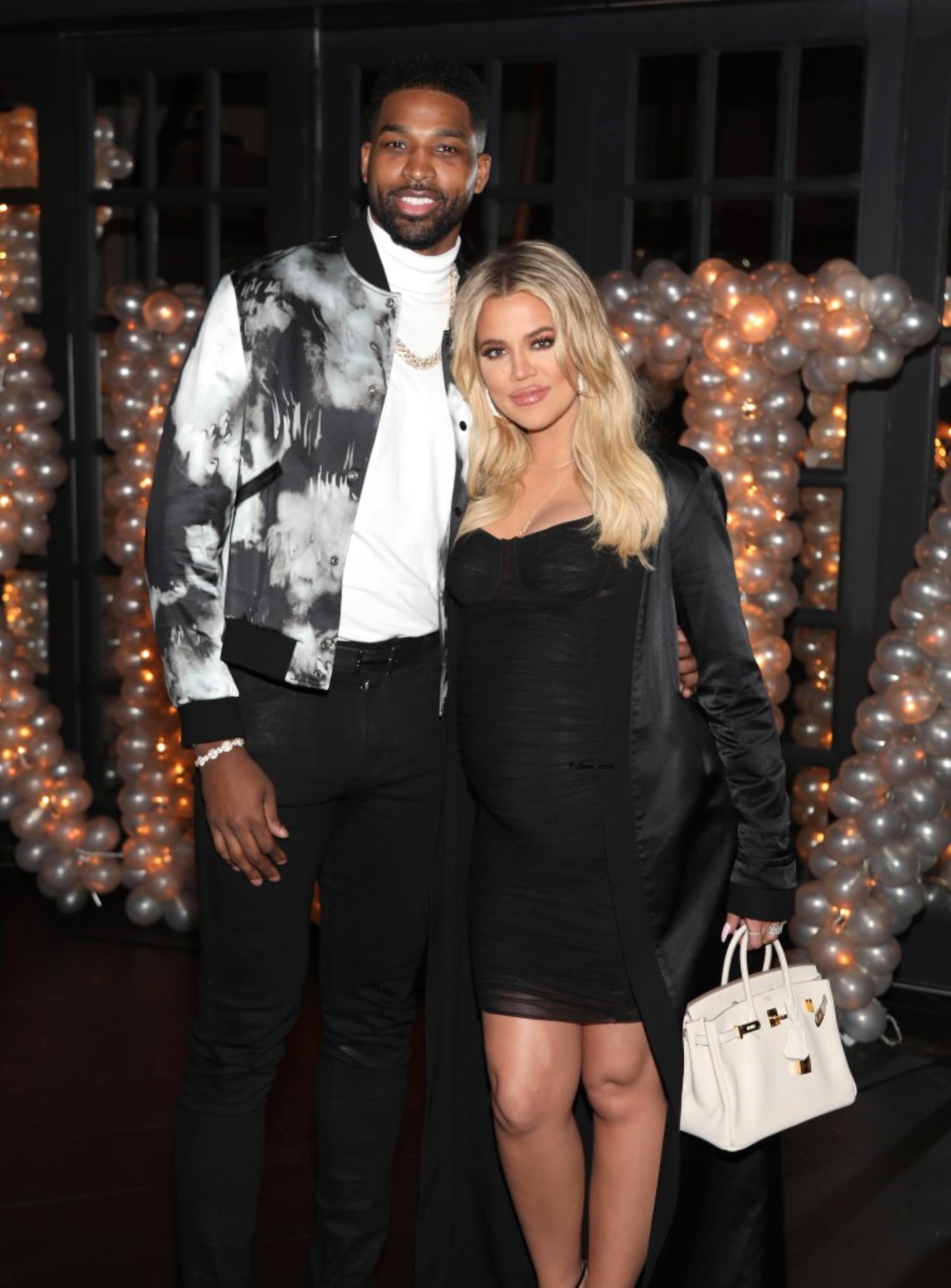Tristan Thompson and Khloe Kardashian posing
