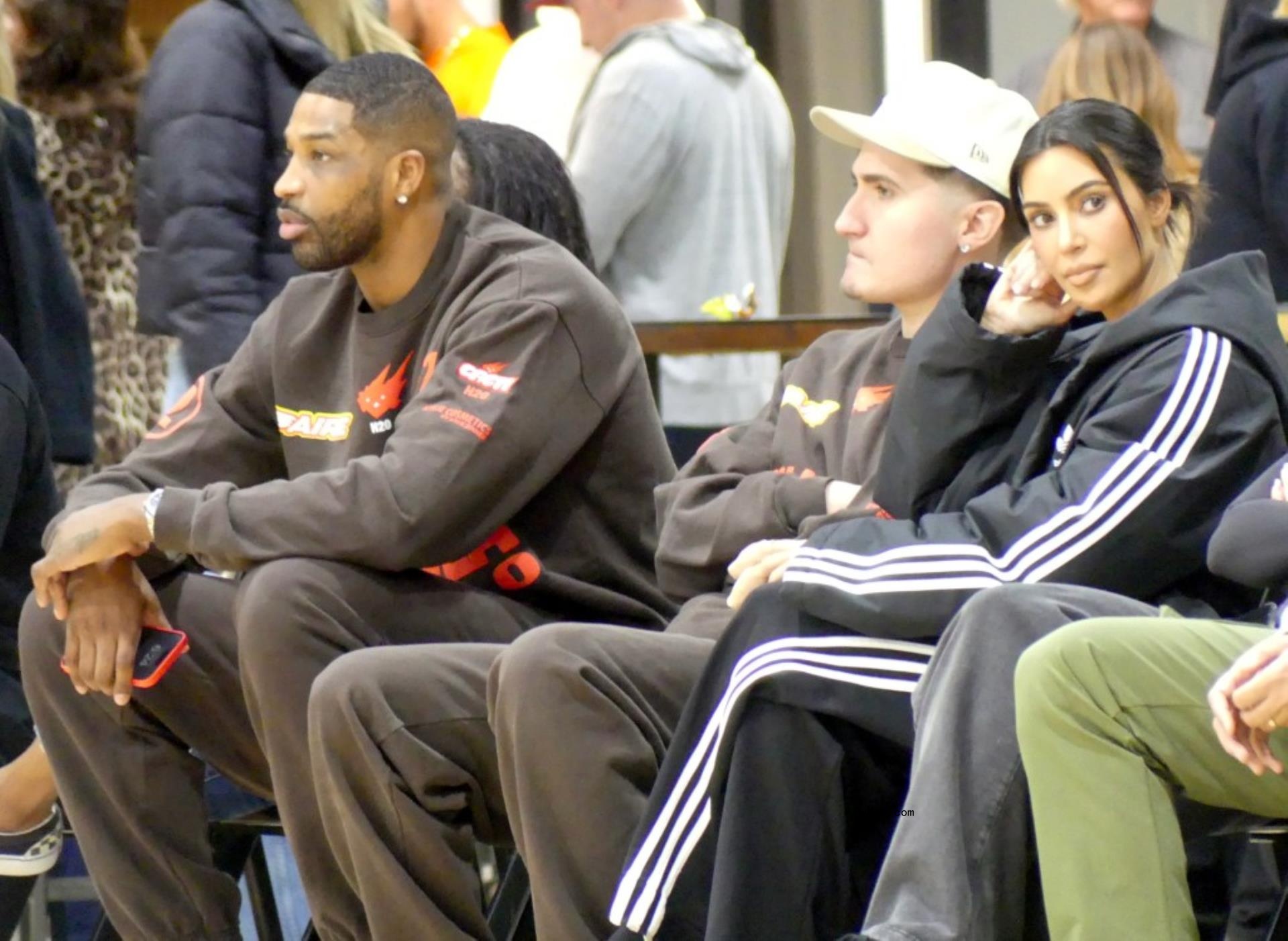 Kim Kardashian and Tristan Thompson sitting
