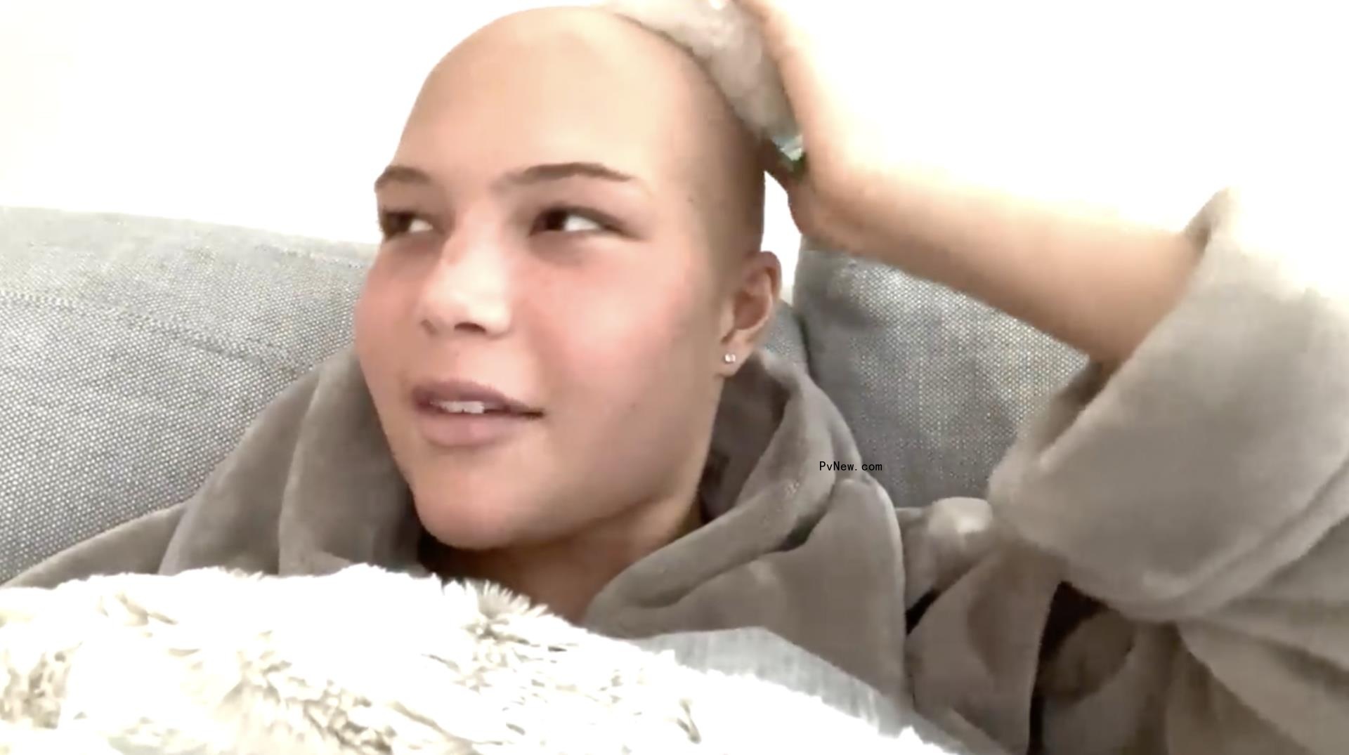 Isabella Strahan with a shaved head.