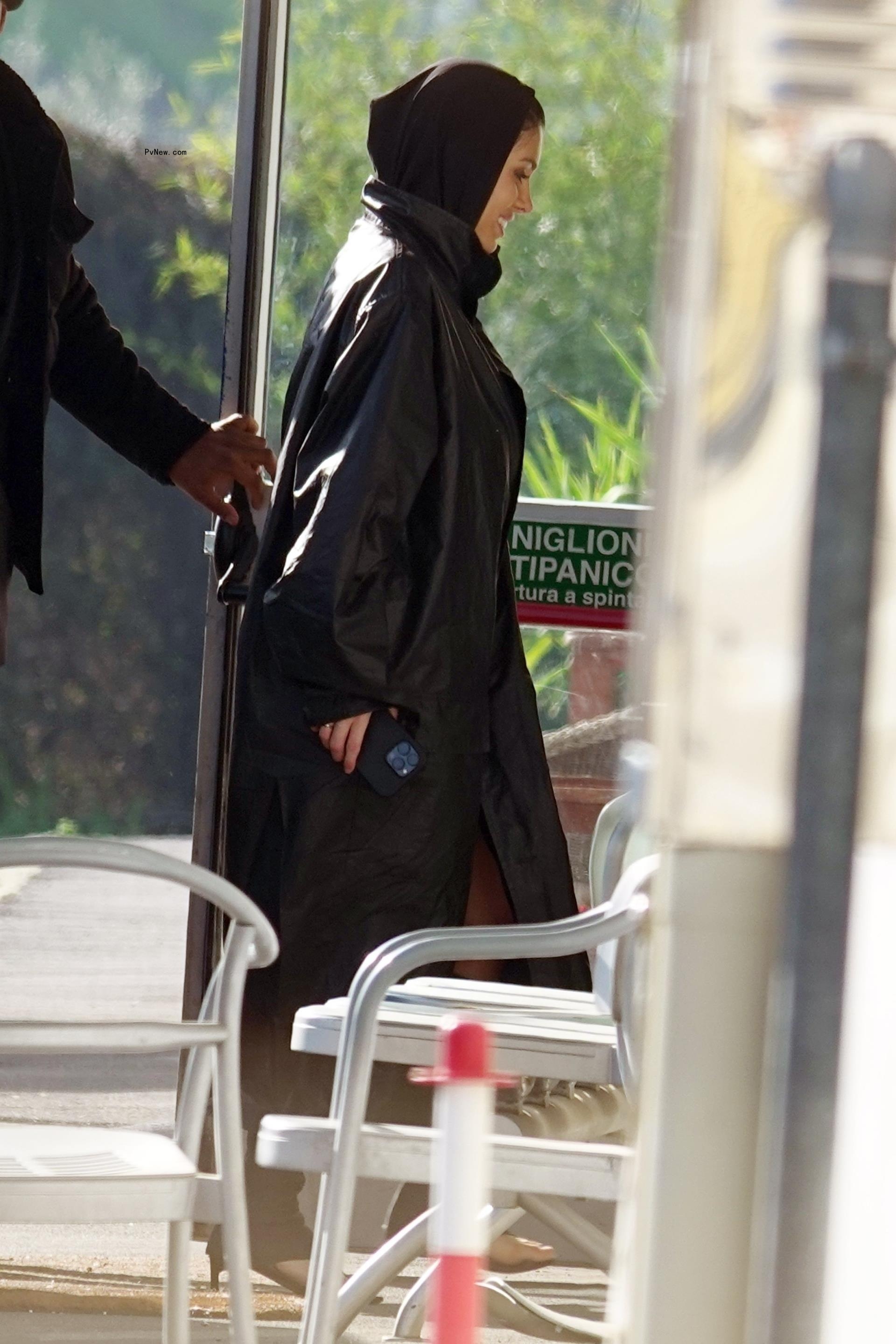 Bianca Censori walking out of a car