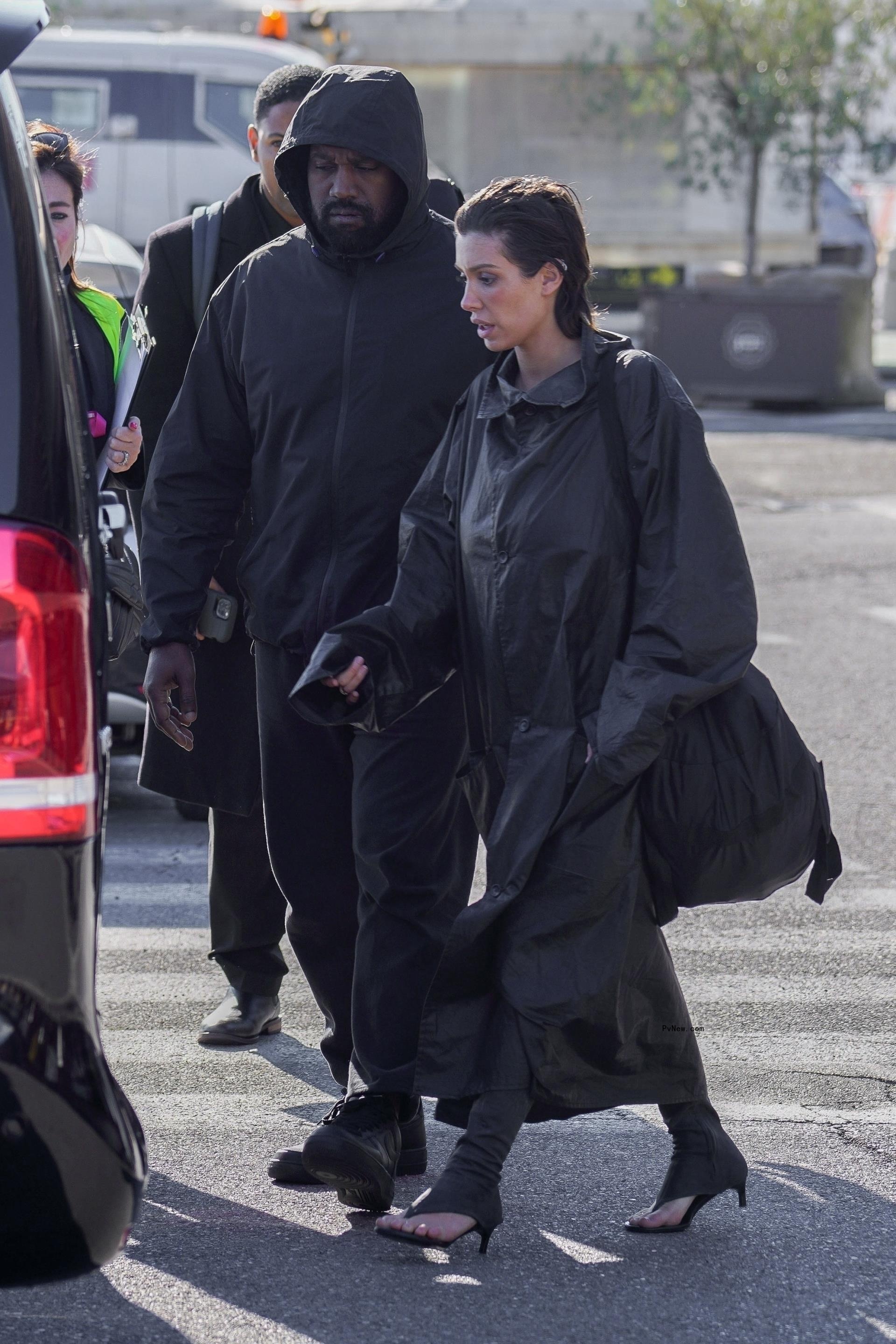 Kanye West and Bianca Censori walking