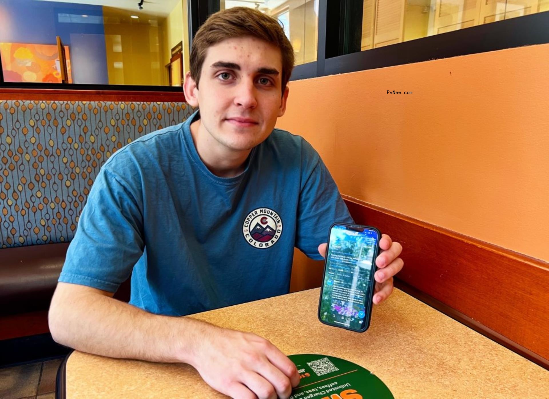 Jack Sweeney displays @elo<i></i>njet on his phone on June 23, 2022 in Clermont, Fla.