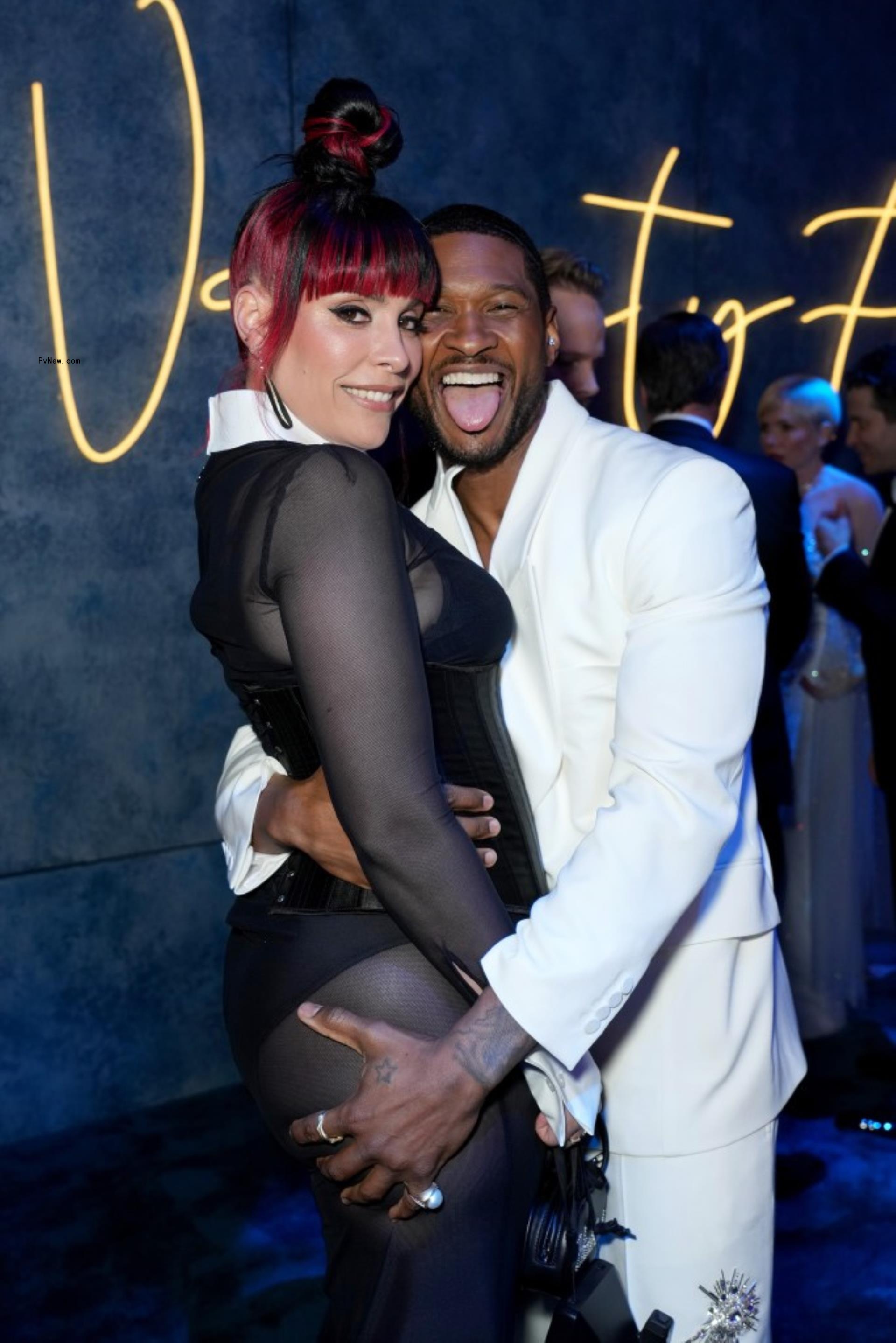 Usher and Jennifer Goicoechea.