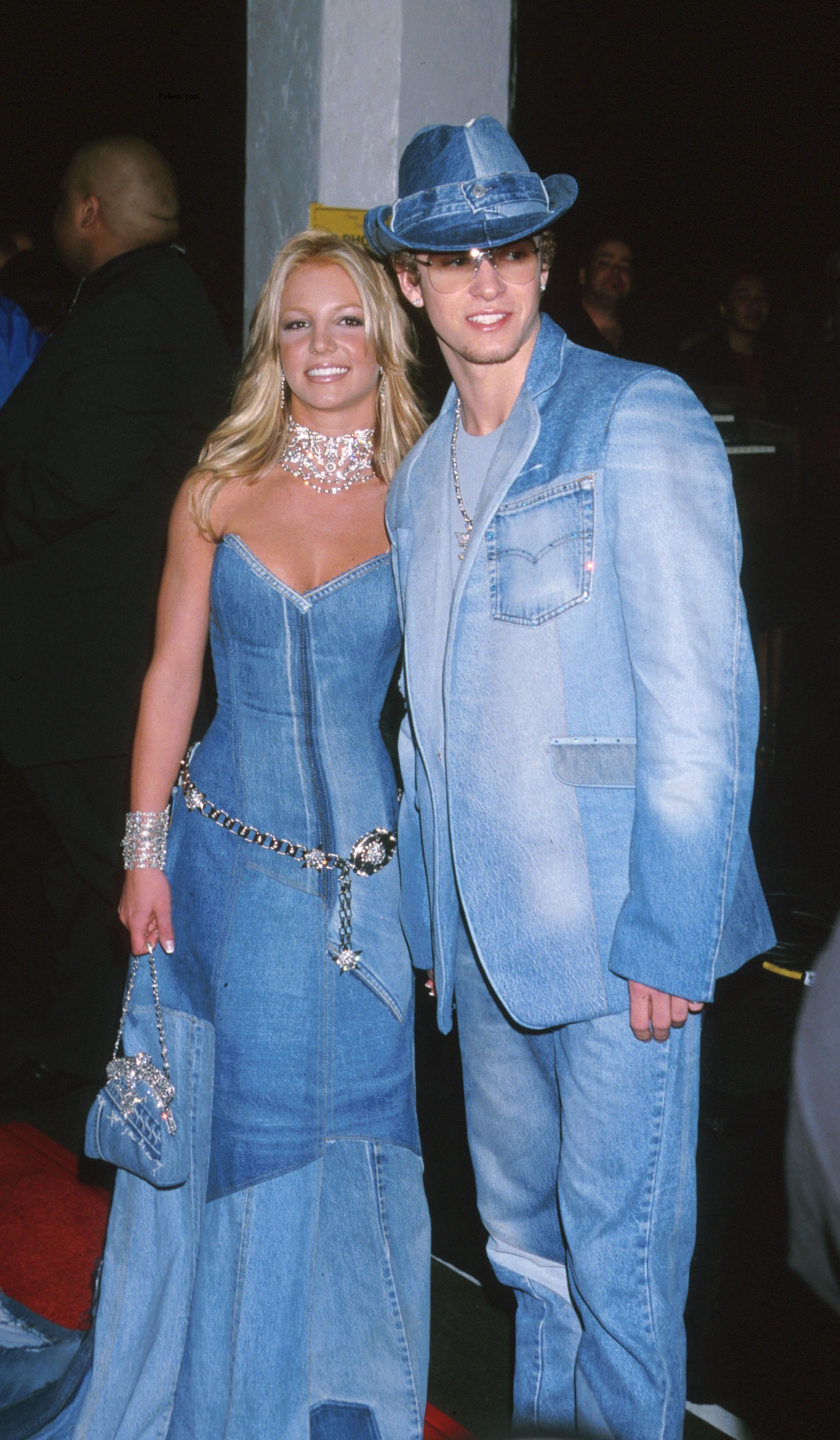 Britney Spears and Justin Timberlake in matching denim outfits at the Shrine Auditorium in Los Angeles, CA