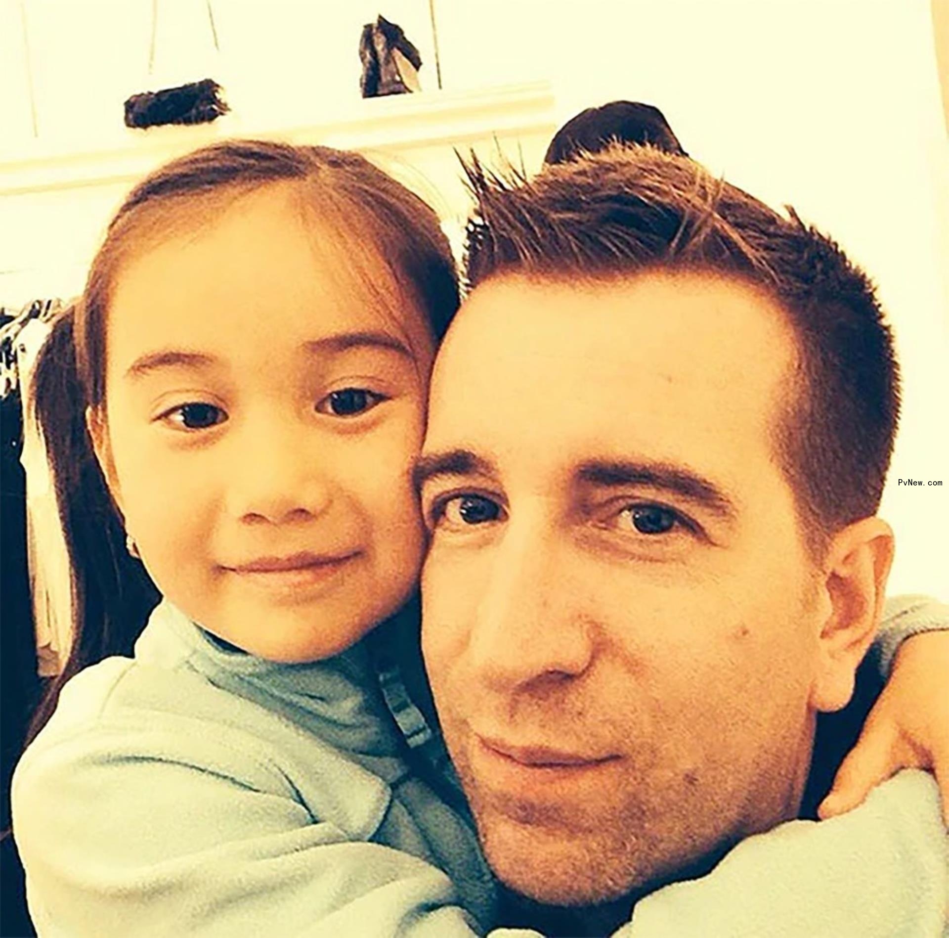 Lil Tay hugging her dad, Christopher Hope.