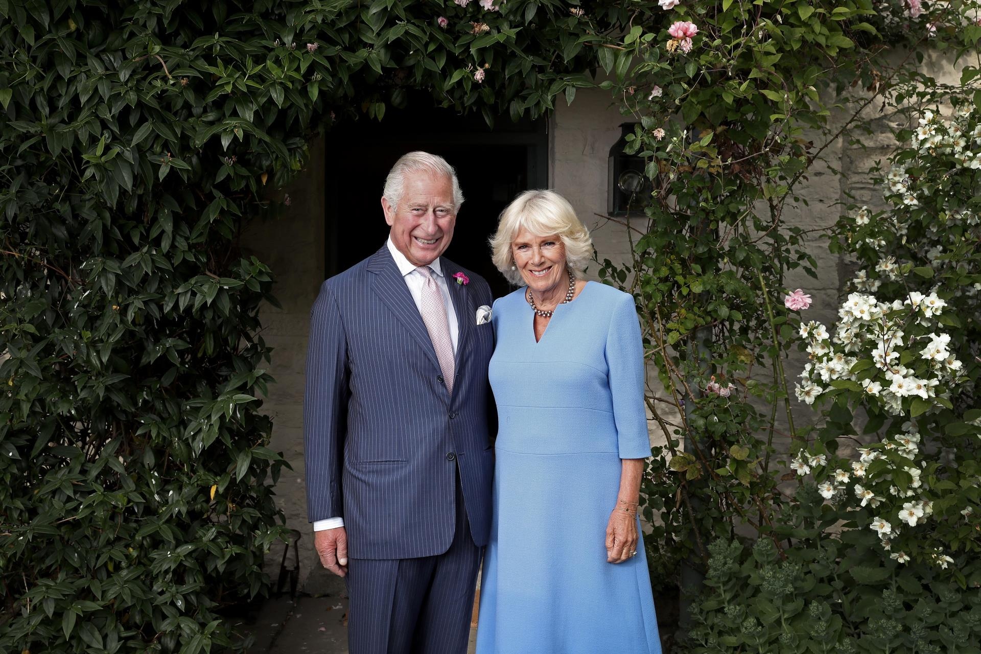 King Charles III and Queen Camilla outside