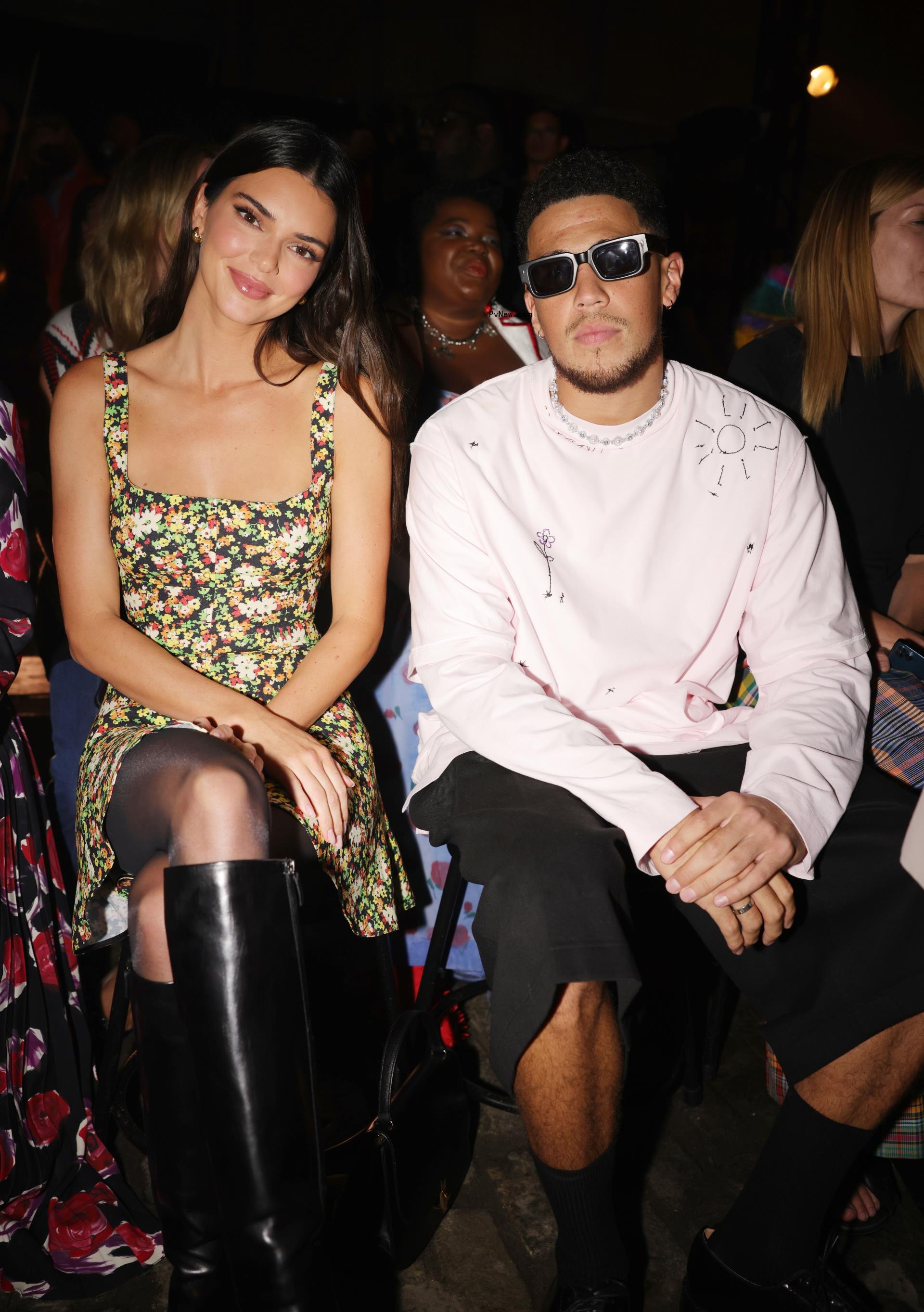 Kendall Jenner and Devin Booker at a fashion show.