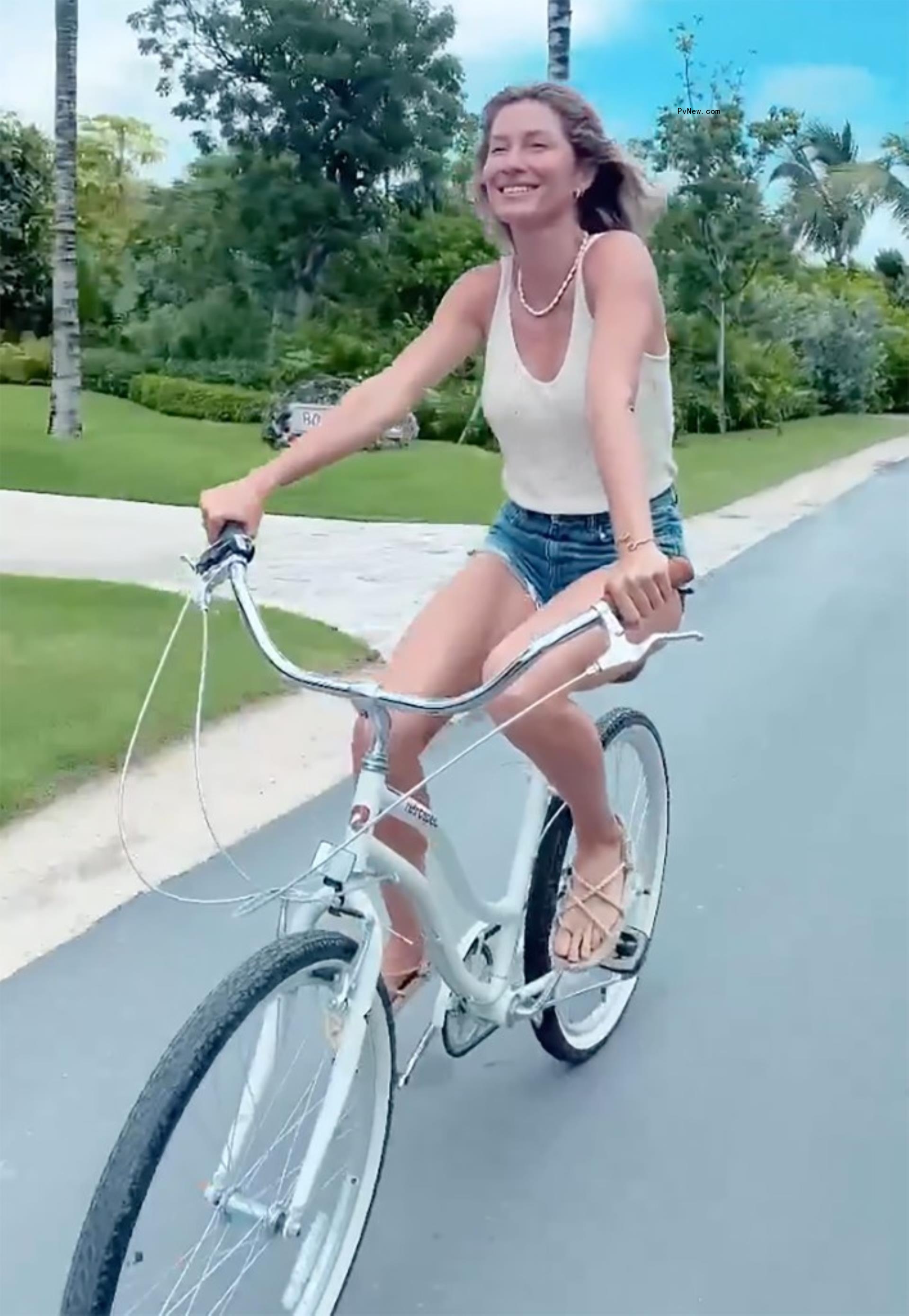 Gisele Bündchen on a bike.