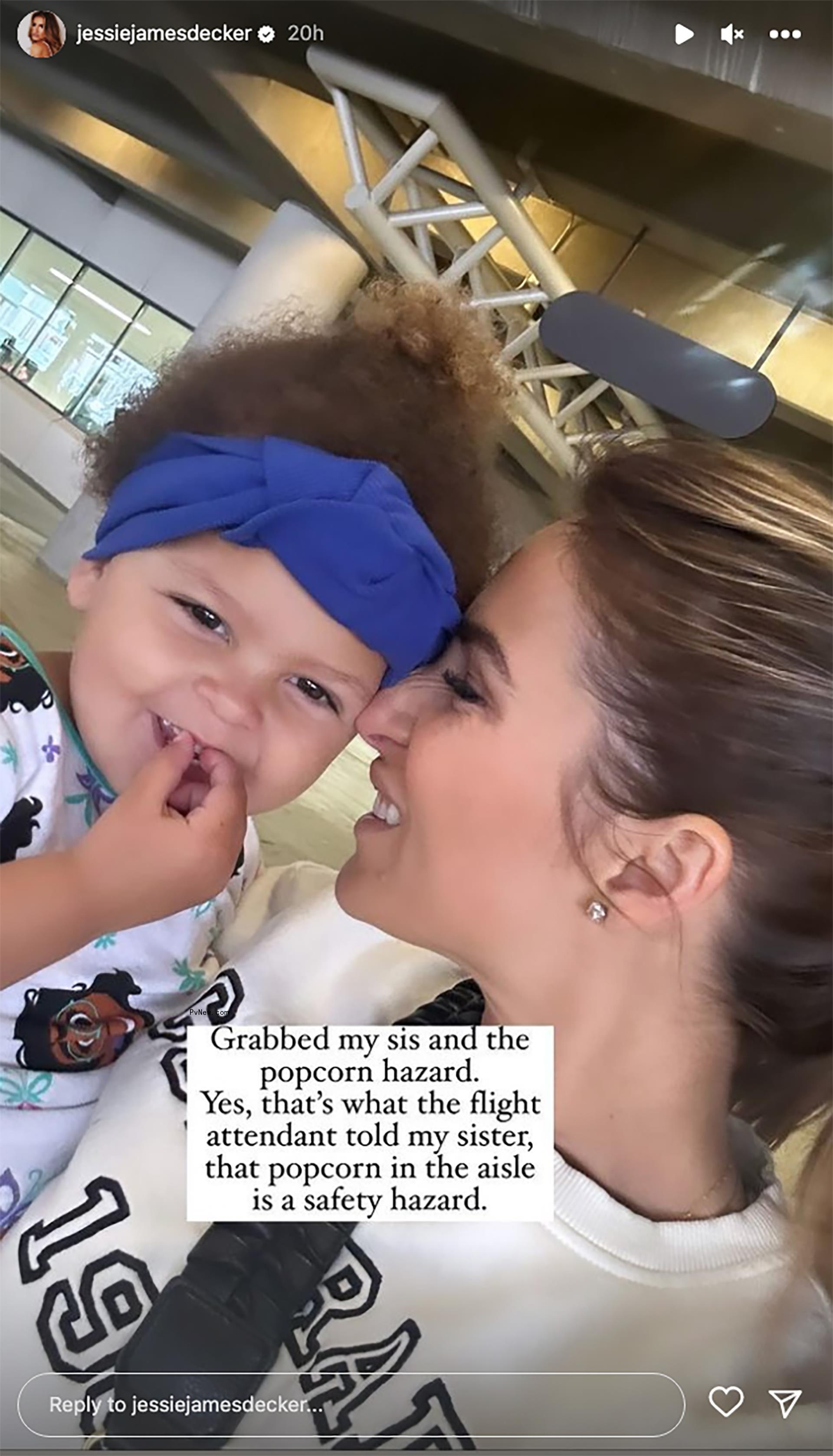 Jessie James Decker smiling while pressing her nose against niece's cheek