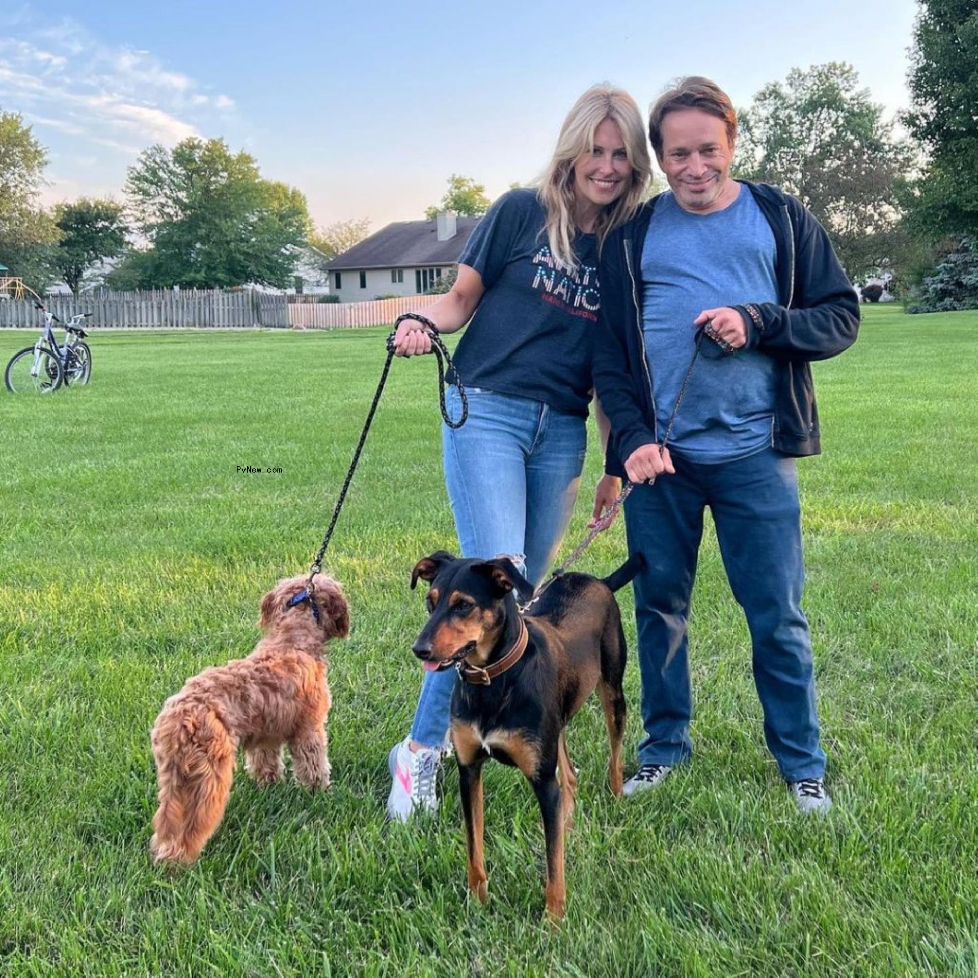 Chris Kattan and Maria Libri with their dogs.