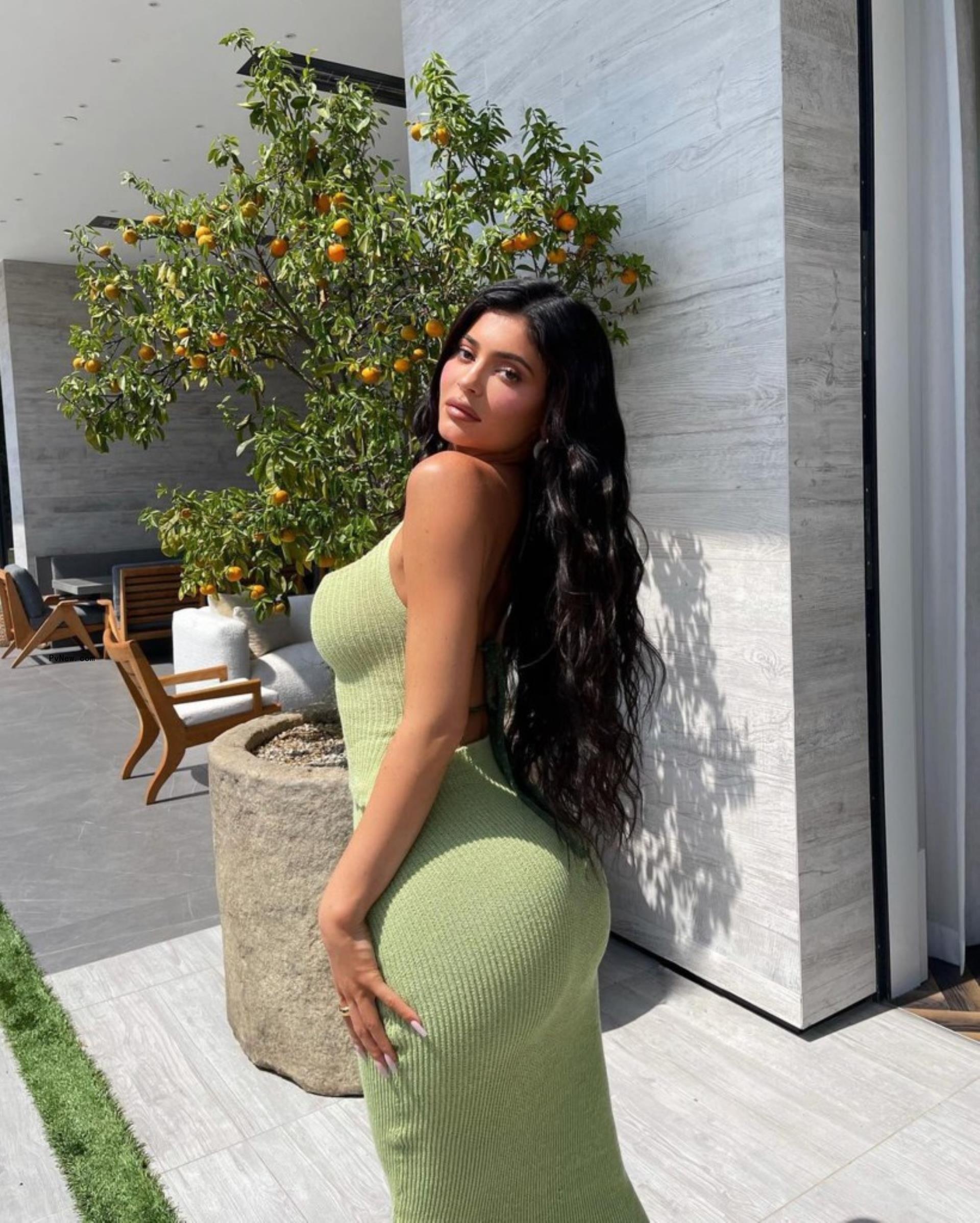 Kylie Jenner in a green dress.