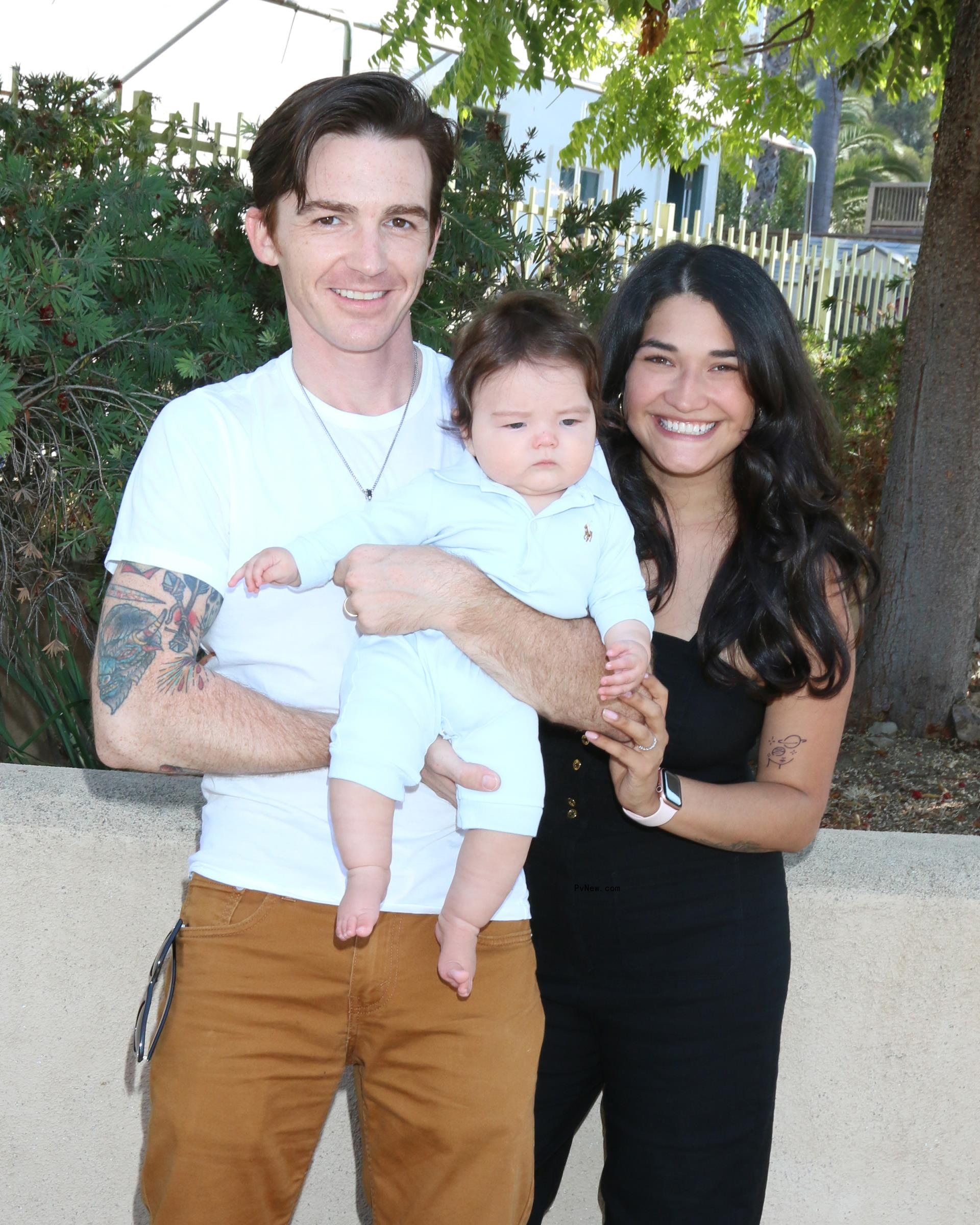 Drake Bell holds son with Janet Von Schmeling