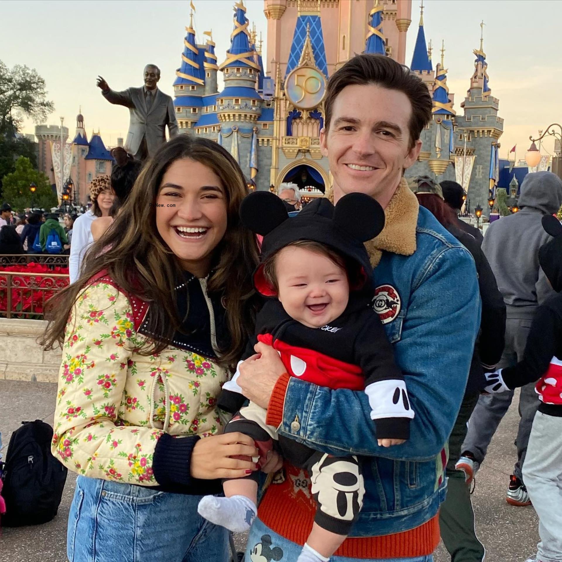 Drake Bell and Janet Von Schmeling at Disneyland with their son