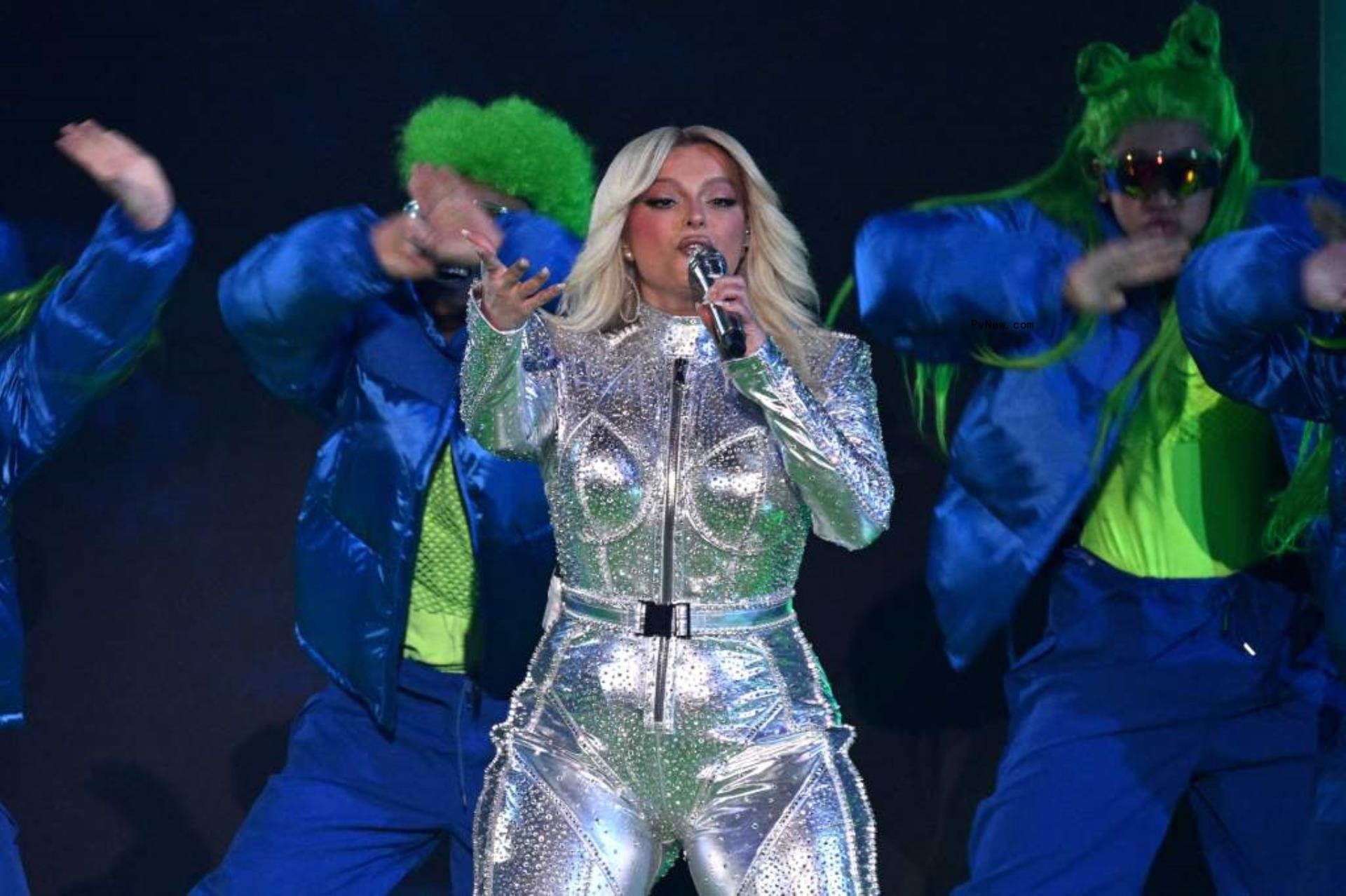 Bebe Rexha performing on stage.