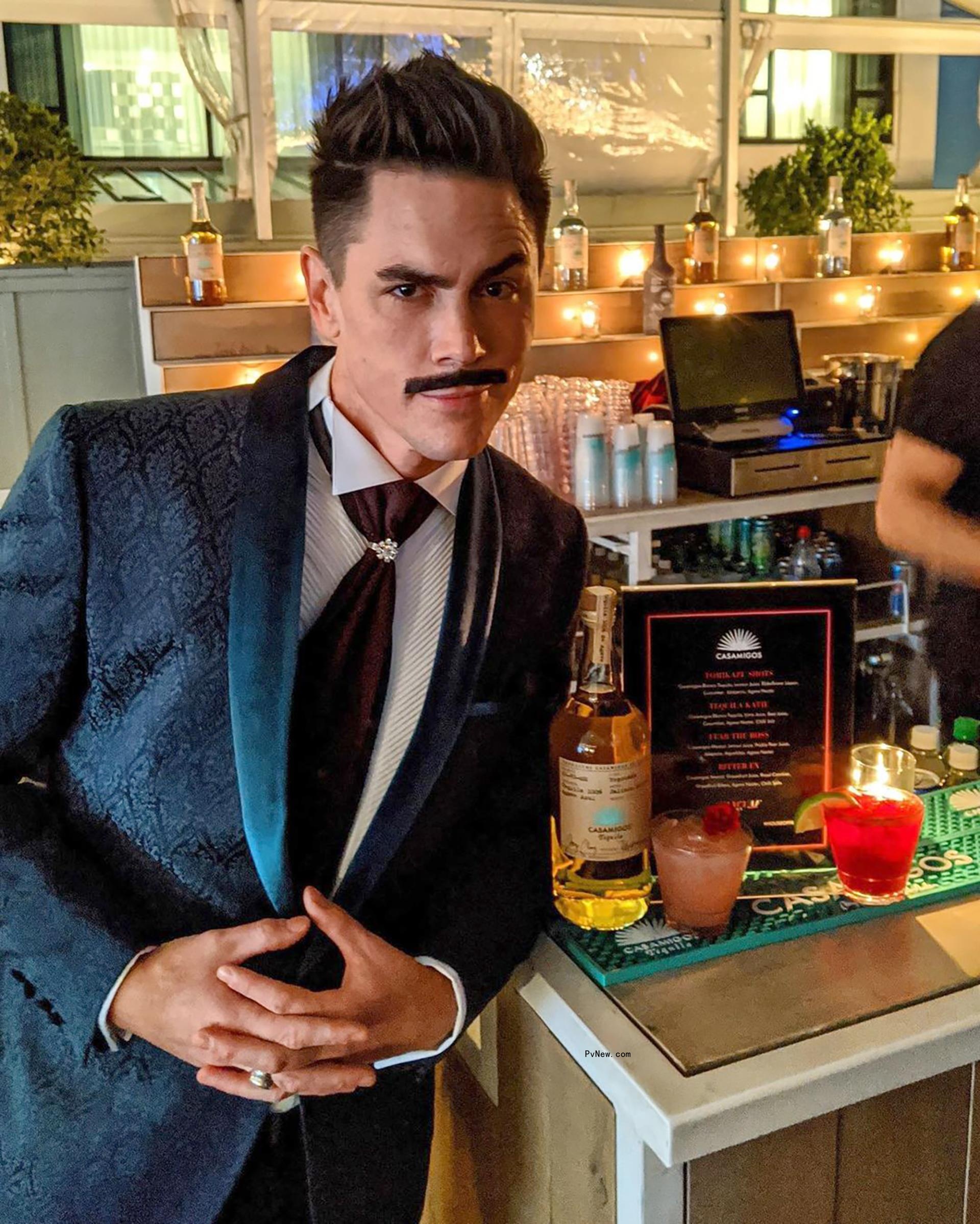 Tom Sandoval poses in suit