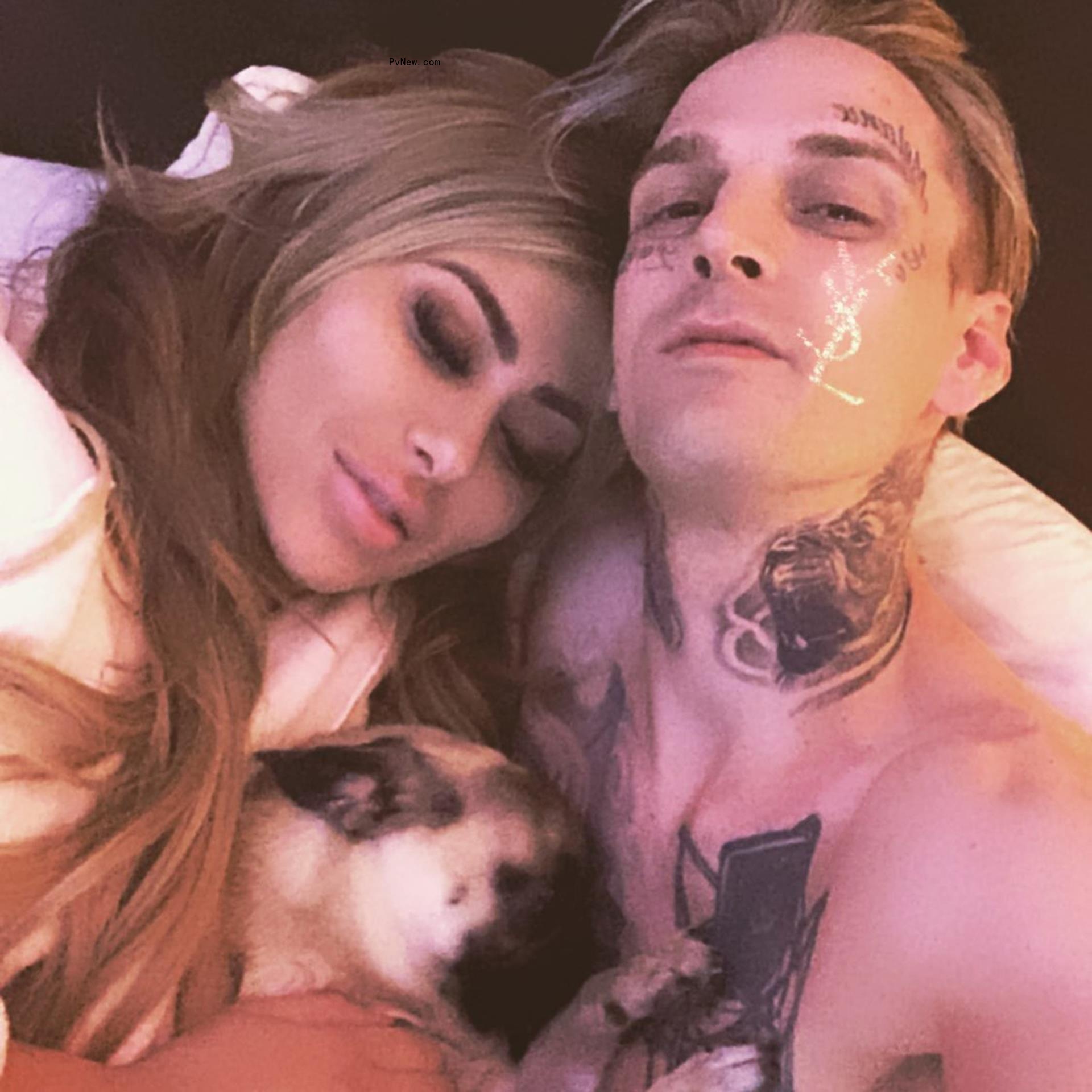 Melanie Martin and Aaron Carter take selfie with dog