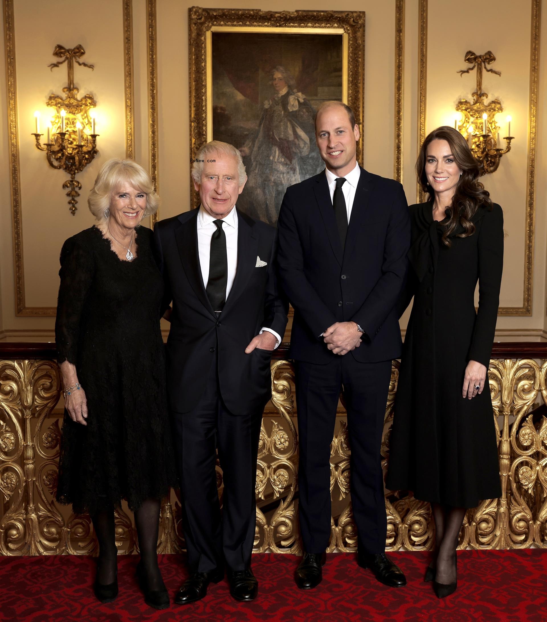 King Charles with Queen Camilla and Prince William and Princess Kate.