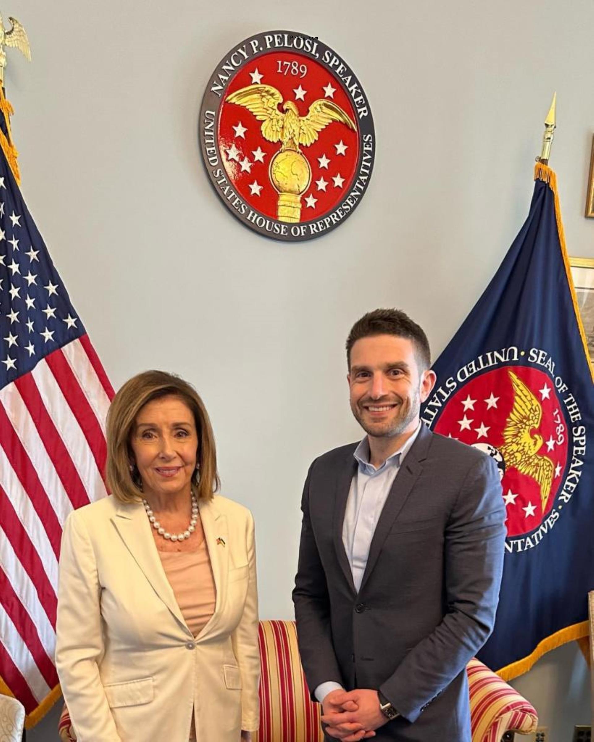Alex Soros stands with NANCY PELOSI.